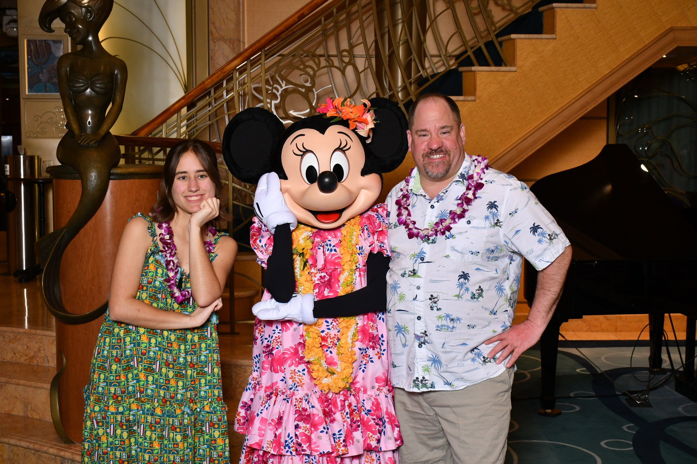 Lisa, Minnie in her pink floral aloha dress & Michael in the Lobby Atrium