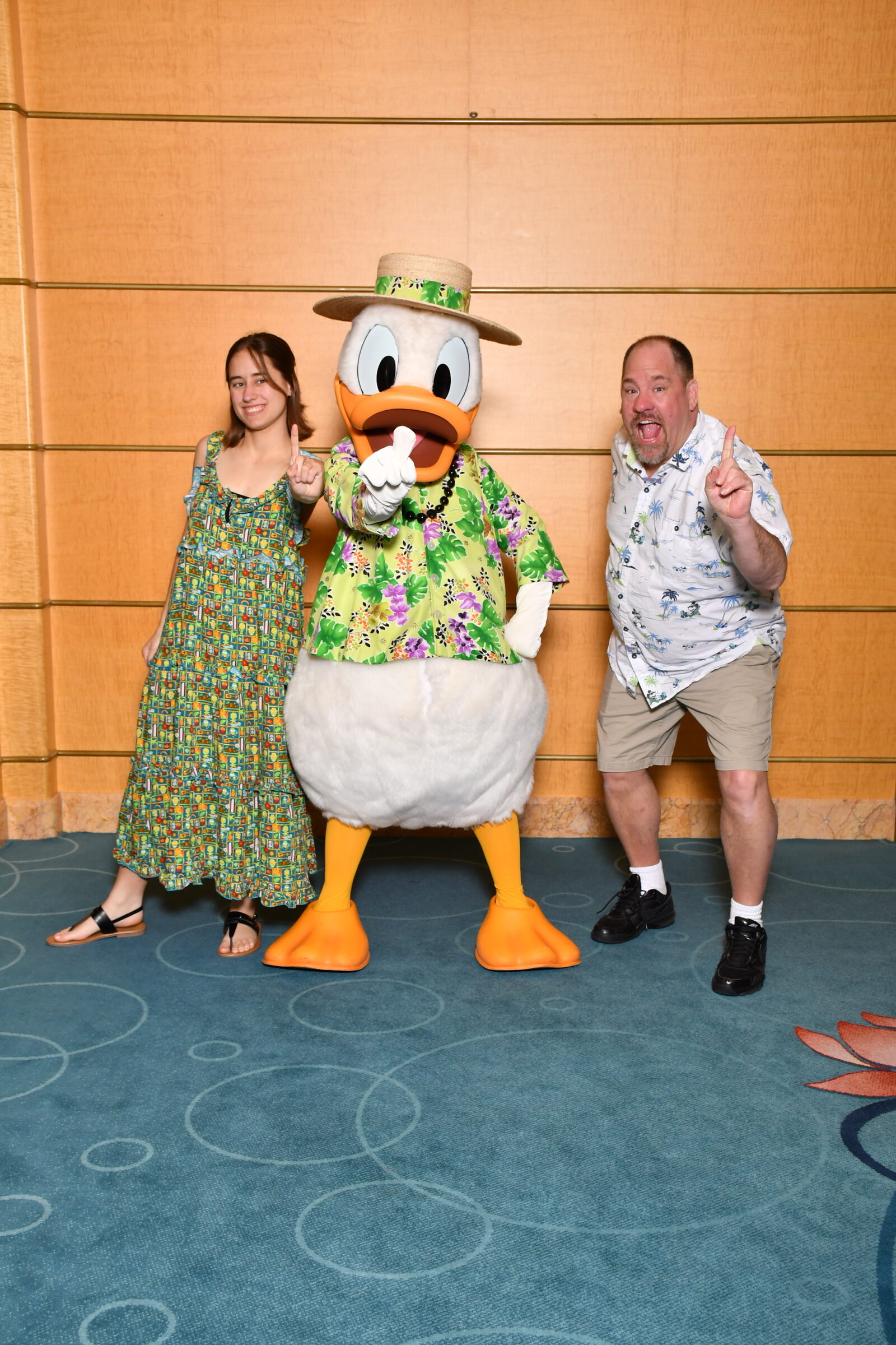 Lisa, Donald in his aloha shirt and straw hat & Michael