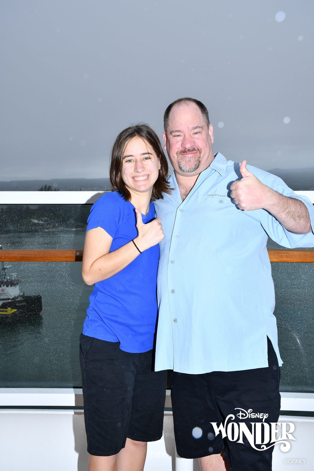 Lisa and Michael on deck in the rain at Hilo
