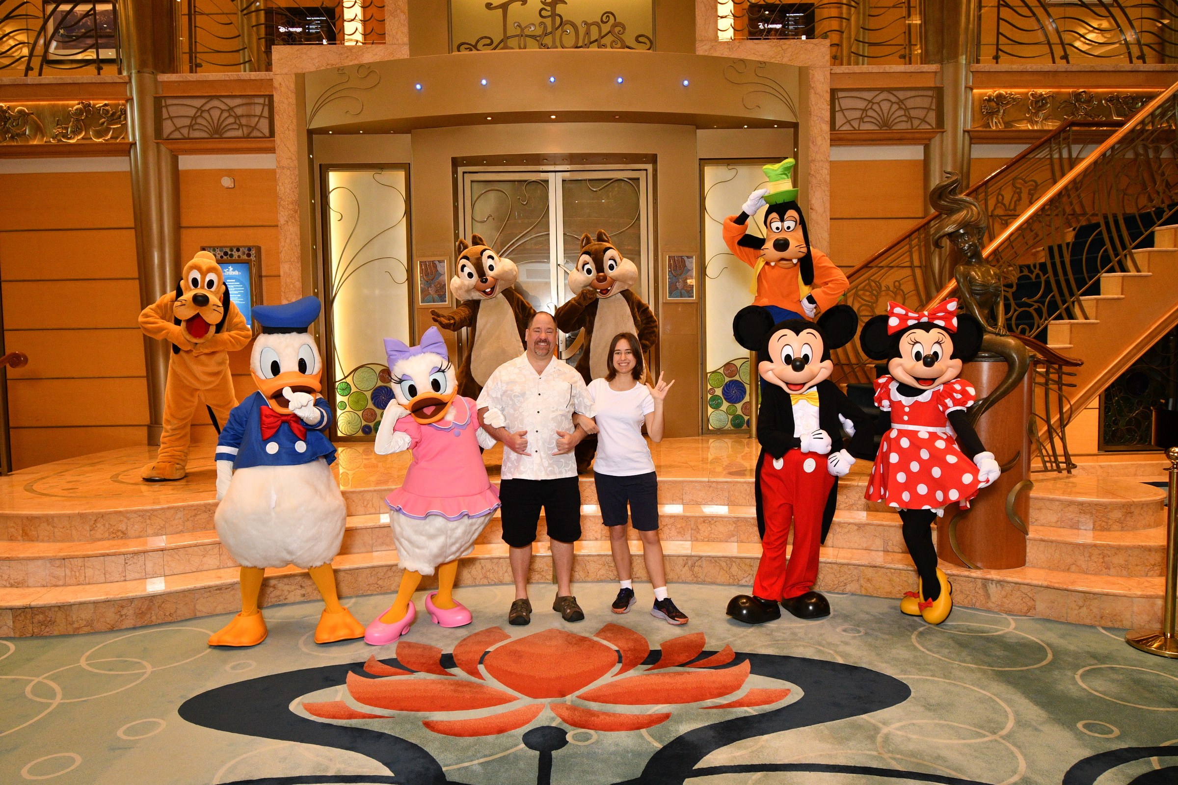 Pluto, Donald, Daisy, Chip, Michael, Lisa, Dale, Goofy, Mickey & Minnie in the Lobby Atrium