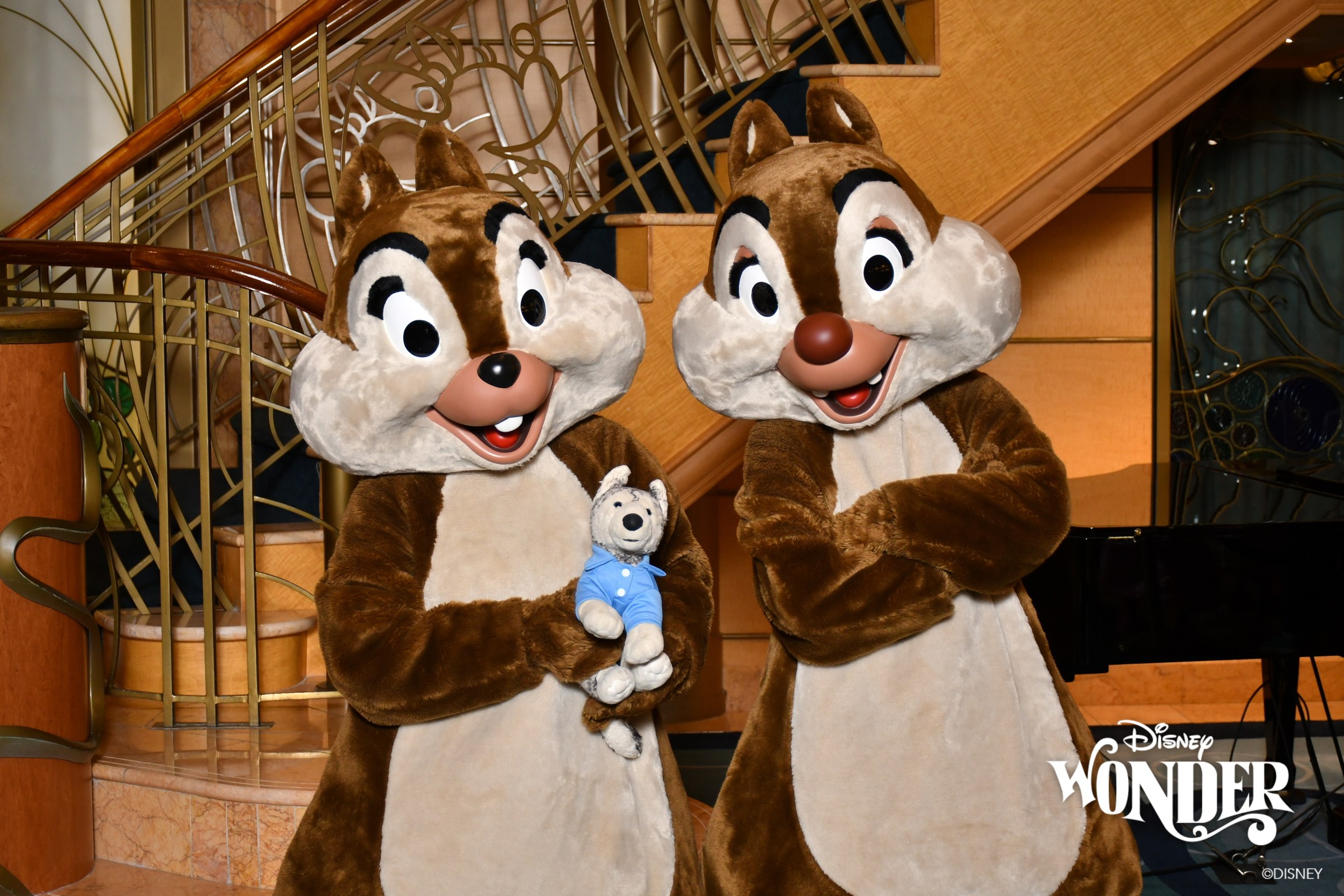 Chip & Dale holding Bob in the Lobby Atrium