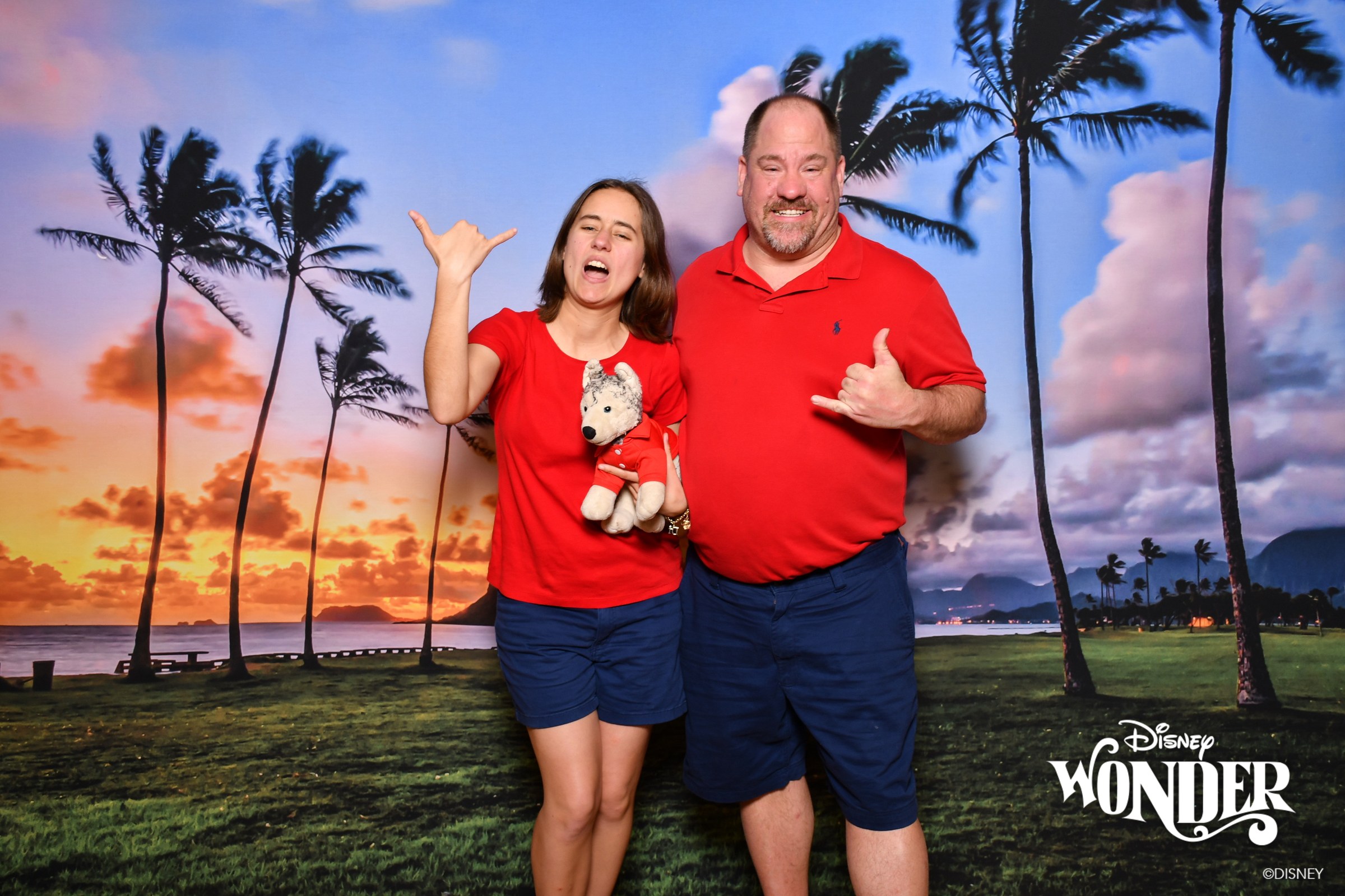 Lisa, Bob and Michael at the Hawaiian sunset backdrop