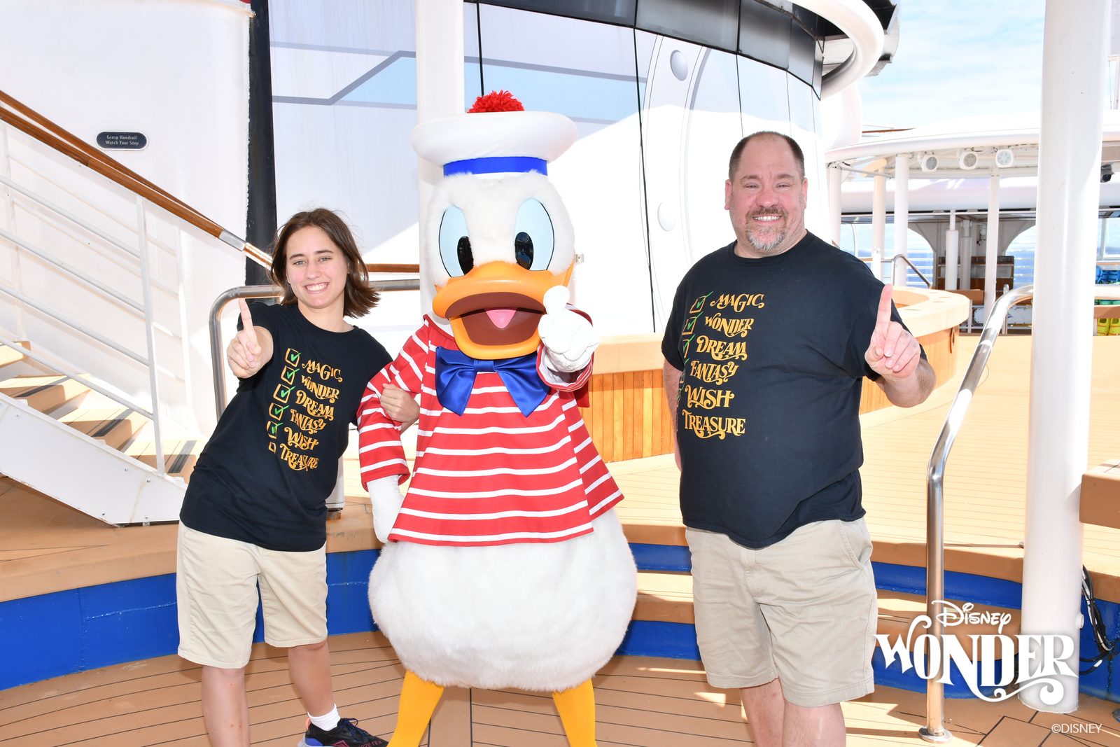 Lisa, Donald in his red-striped sailor outfit & Michael on deck