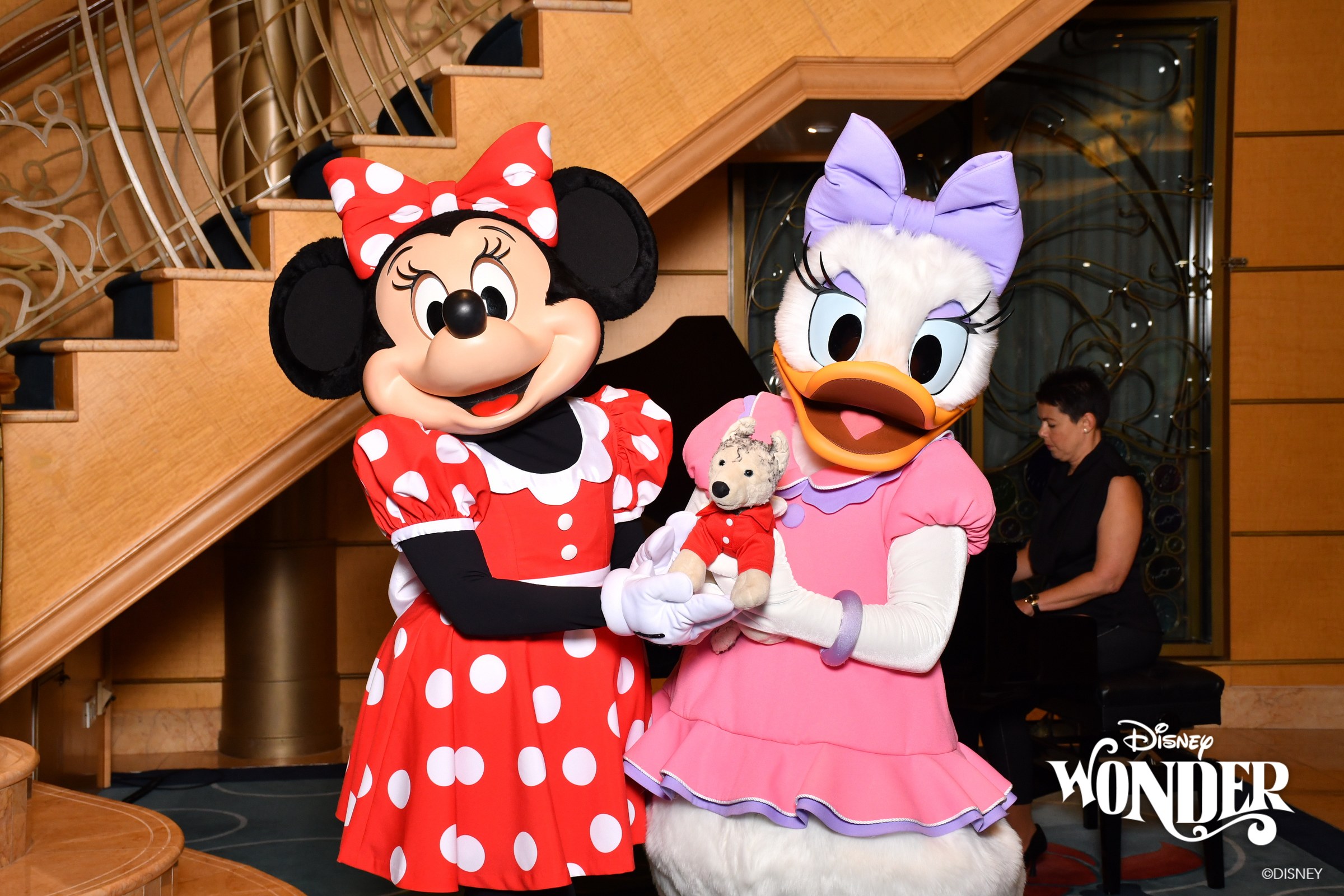 Minnie & Daisy holding Bob in the Lobby Atrium