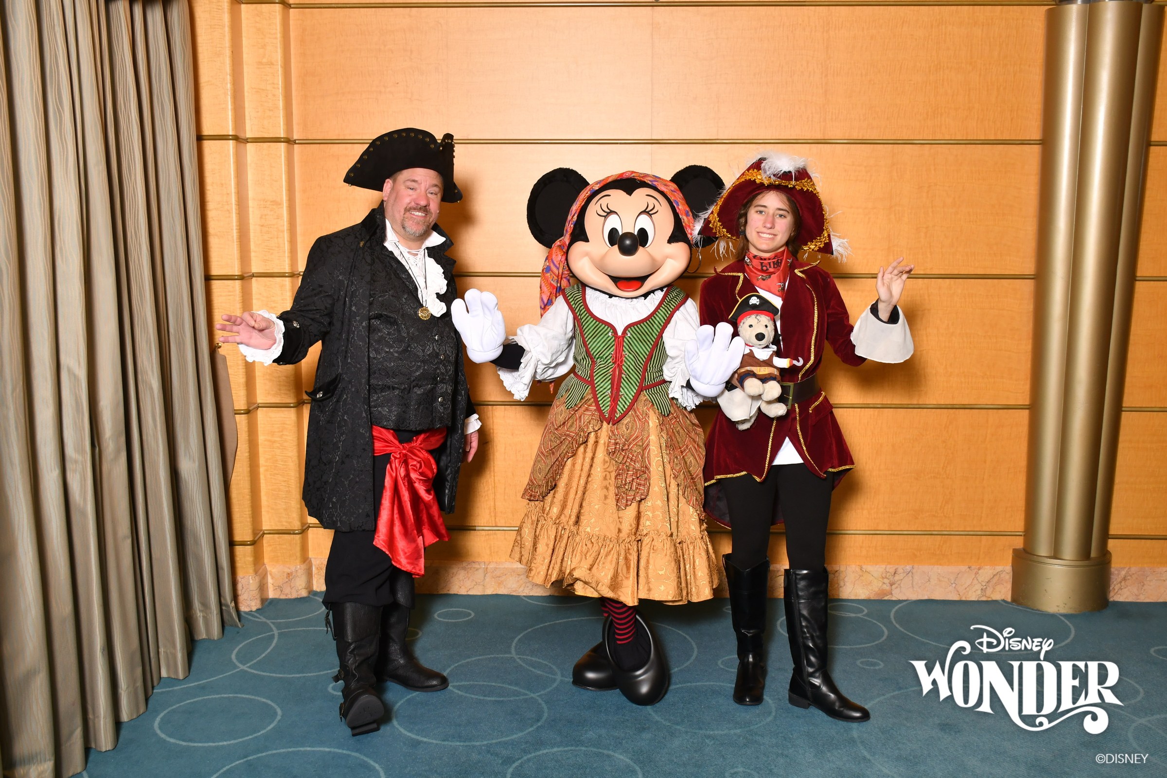 Michael, Minnie in pirate garb & Lisa at Pirate Night, Bob along too