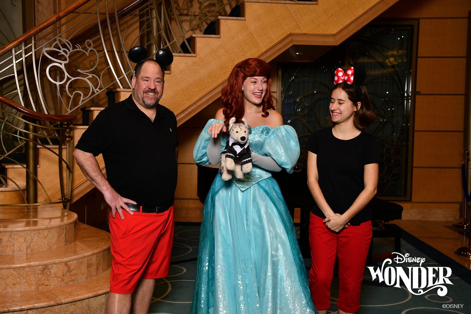 Ariel holds Bob for a photo