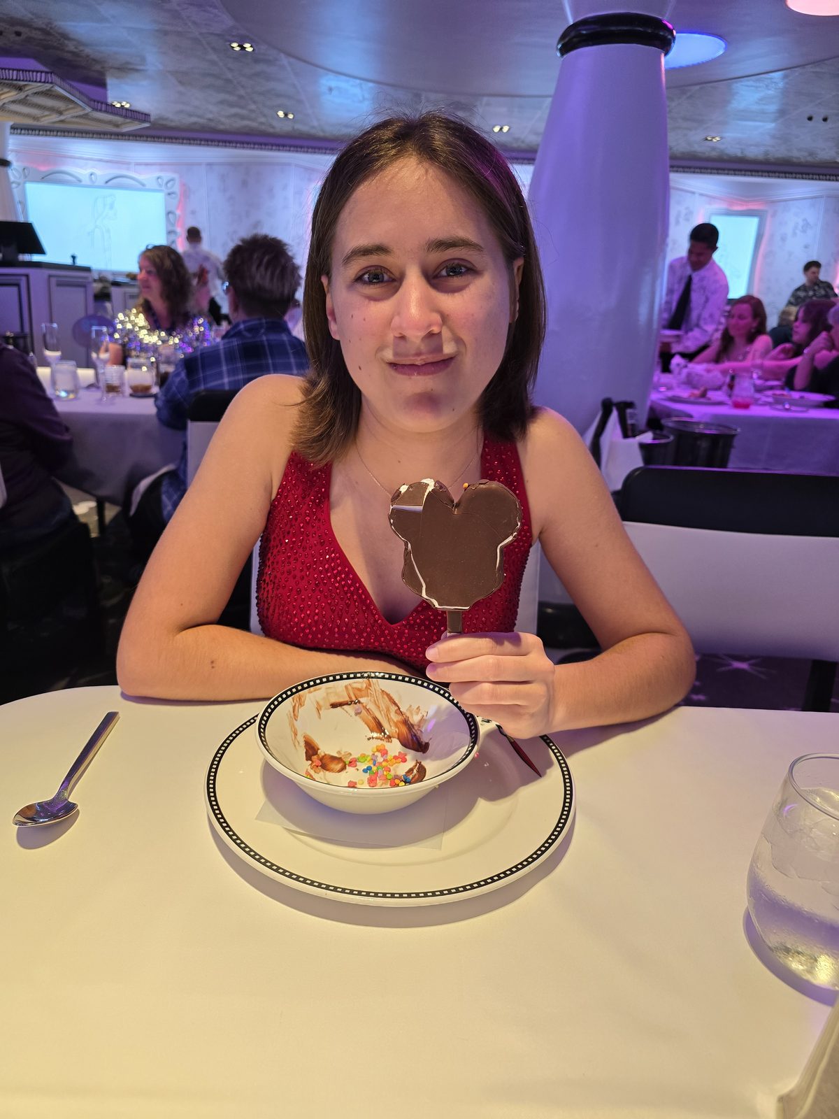 Lisa with a Mickey bar at dinner on Formal Night