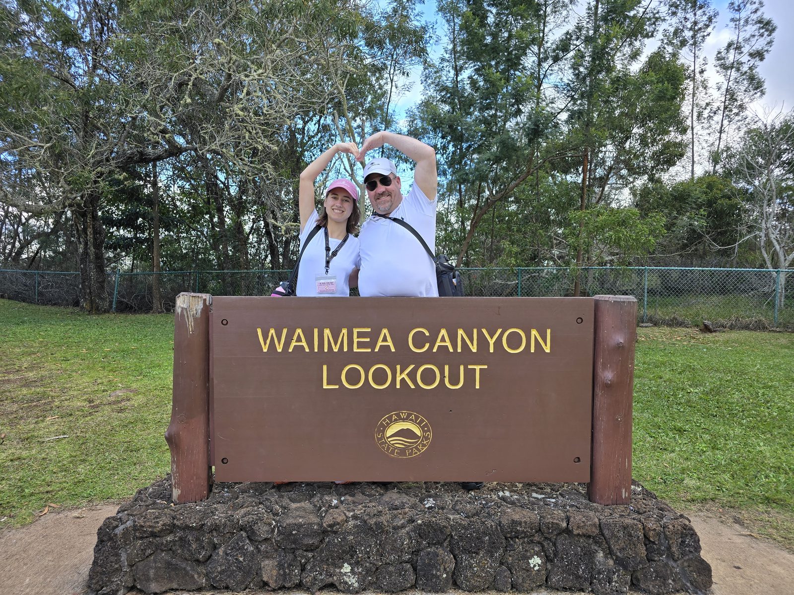 Lisa and Michael making a heart at Waimea Canyon Lookout