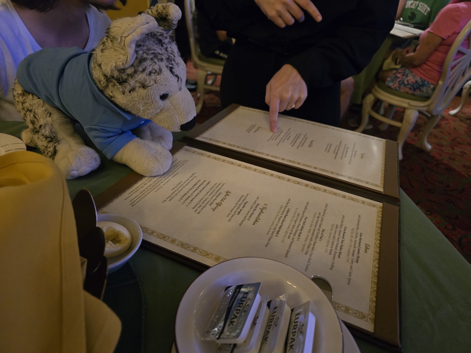 Stephanie helping Lisa order dinner