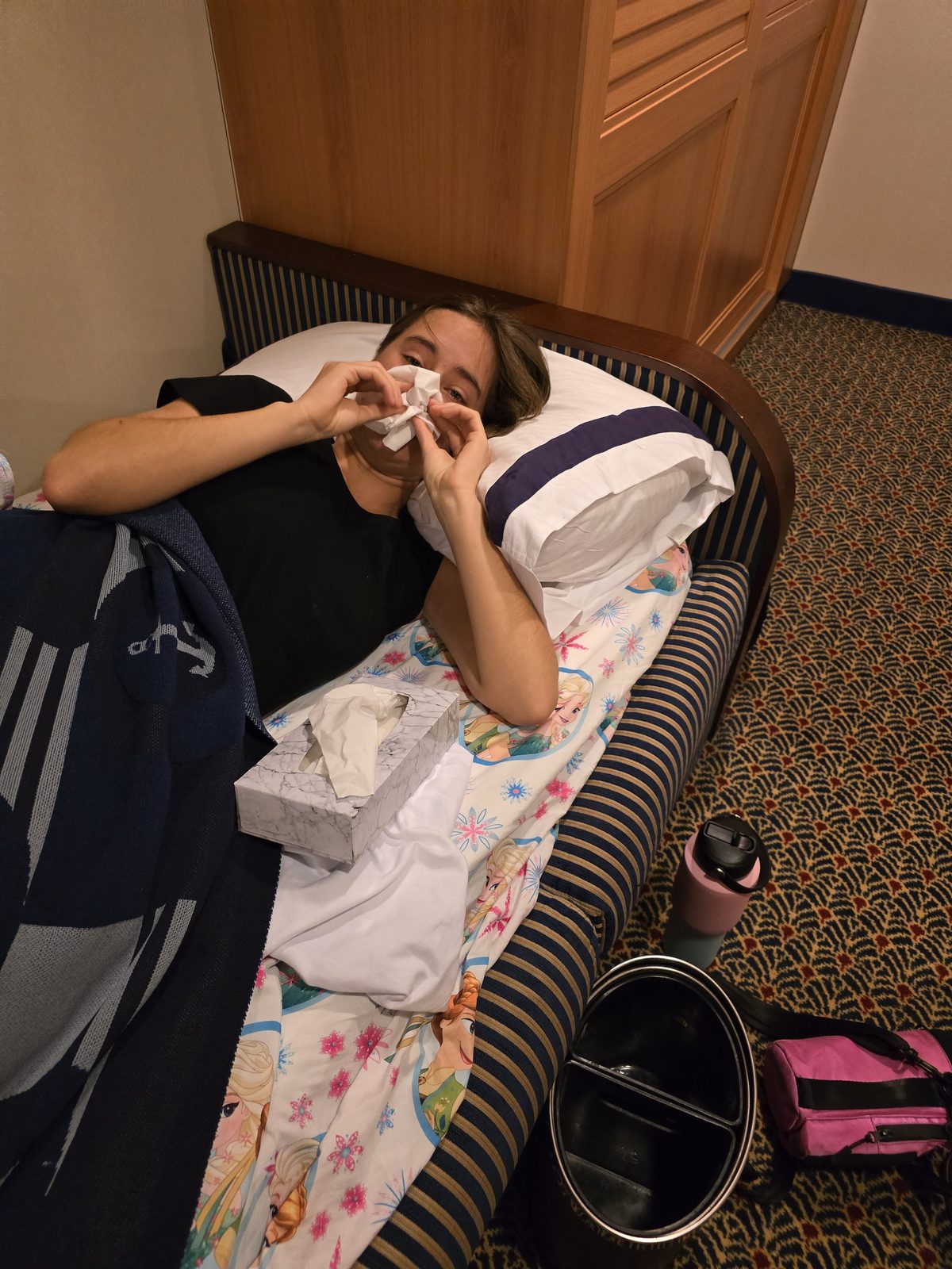 Lisa fighting a cold in bed