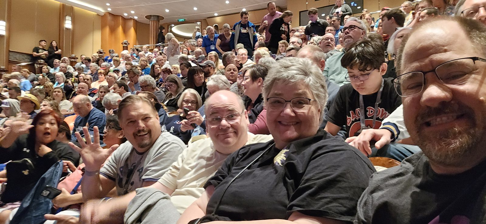A packed theatre at midday