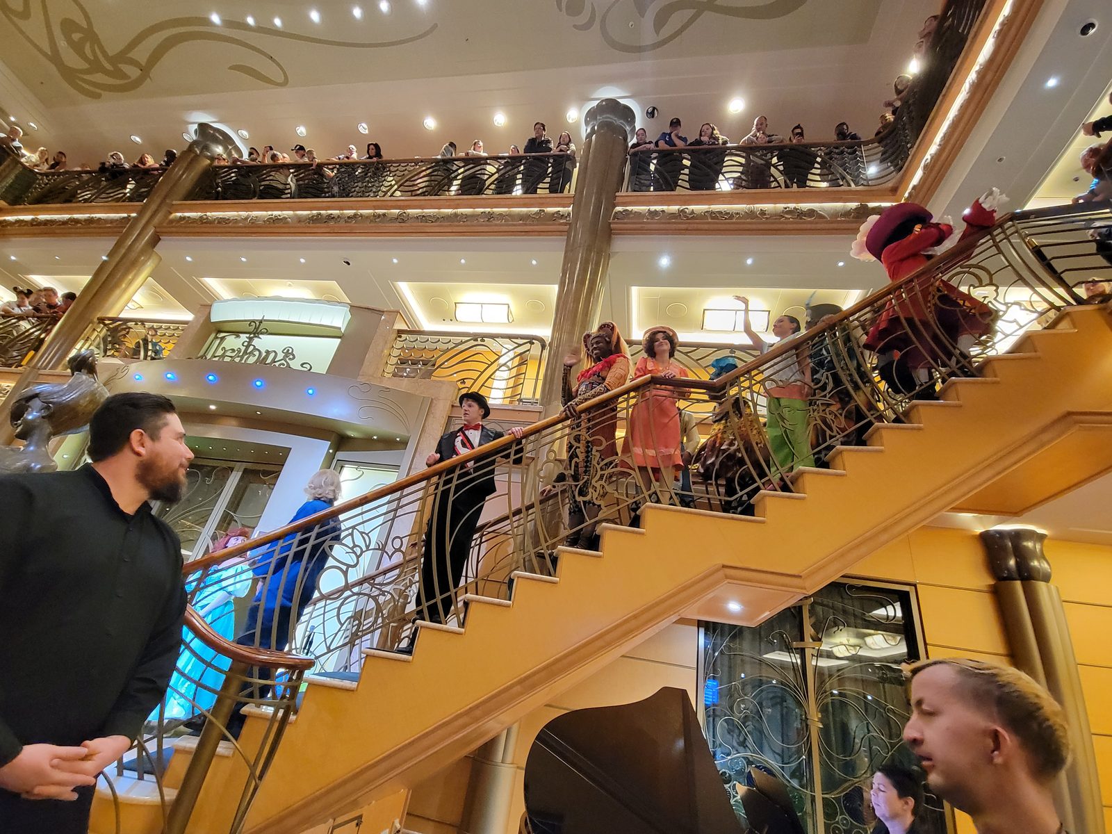 Costumed performers on the staircase