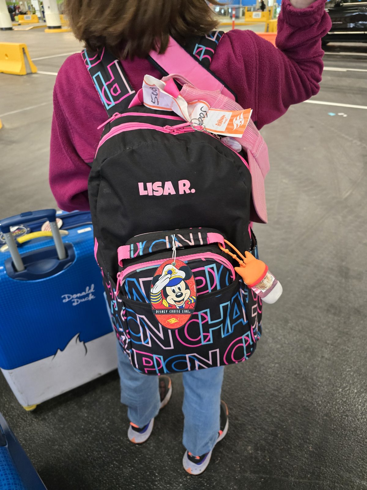 Lisa ready to disembark with her backpack