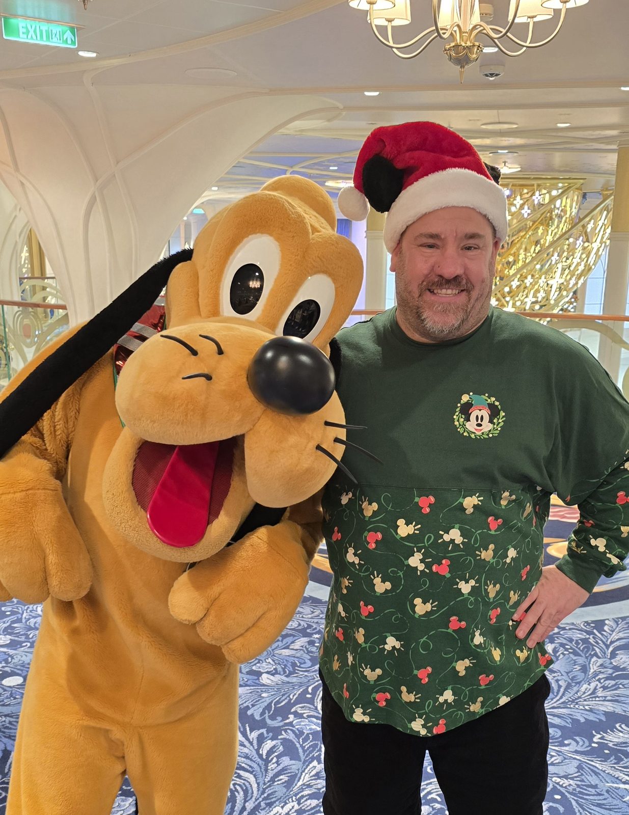 Pluto in his Santa hat with me