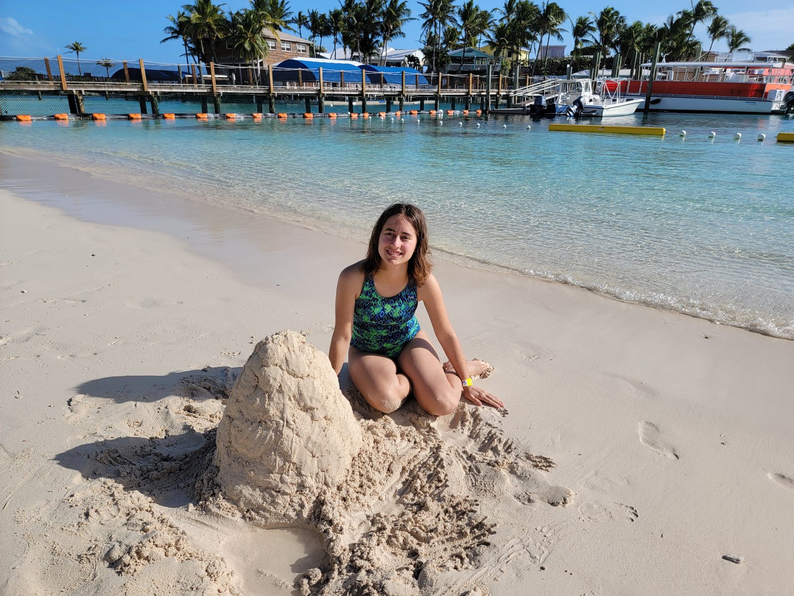 Lisa building a sandcastle at Blue Lagoon Island