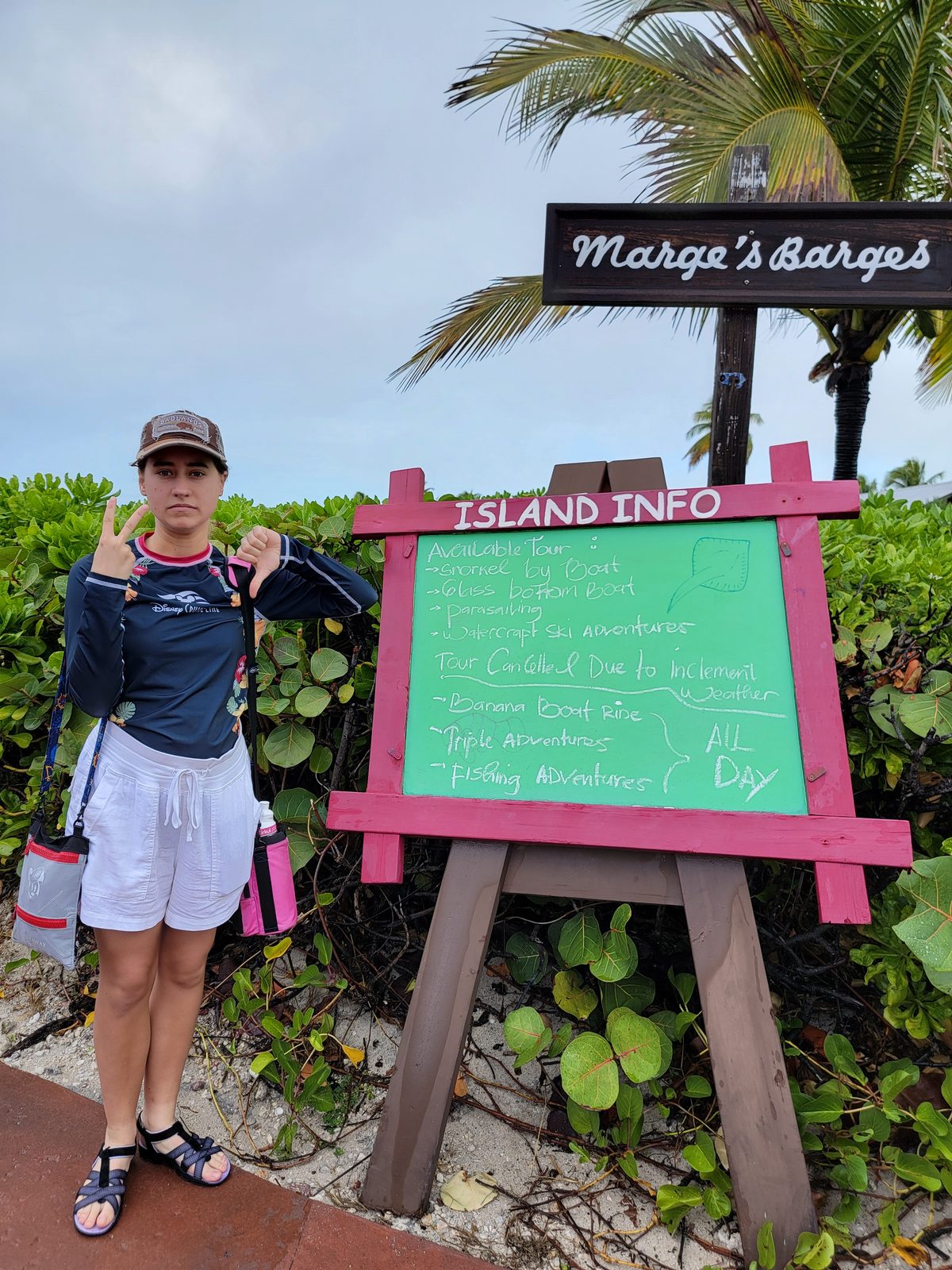 Lisa by the Island Info sign on Castaway Cay
