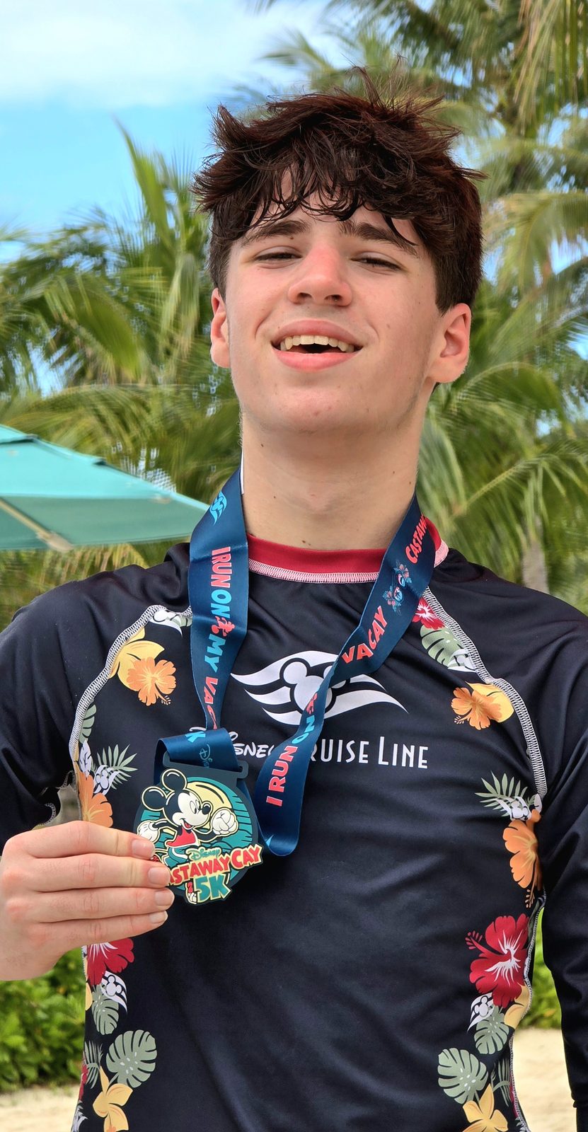 Thomas with his Castaway Cay 5K medal