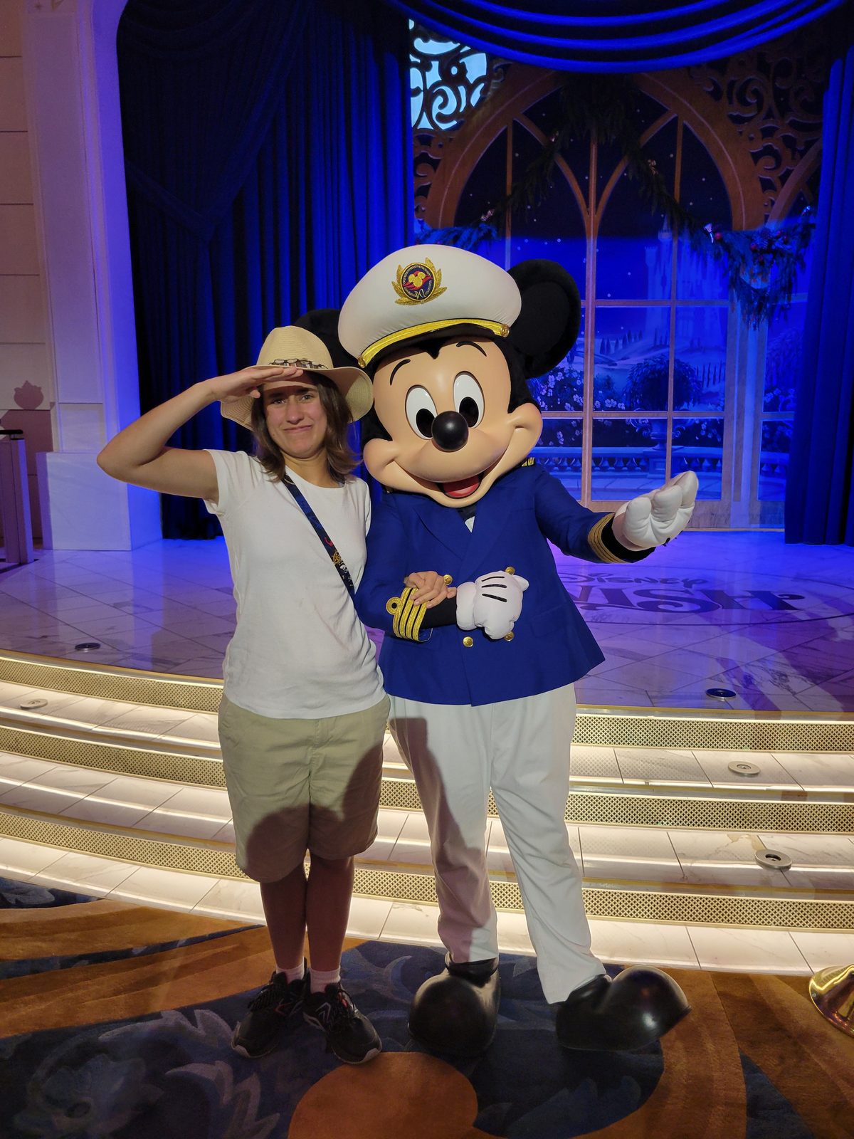 Lisa salutes alongside Captain Mickey