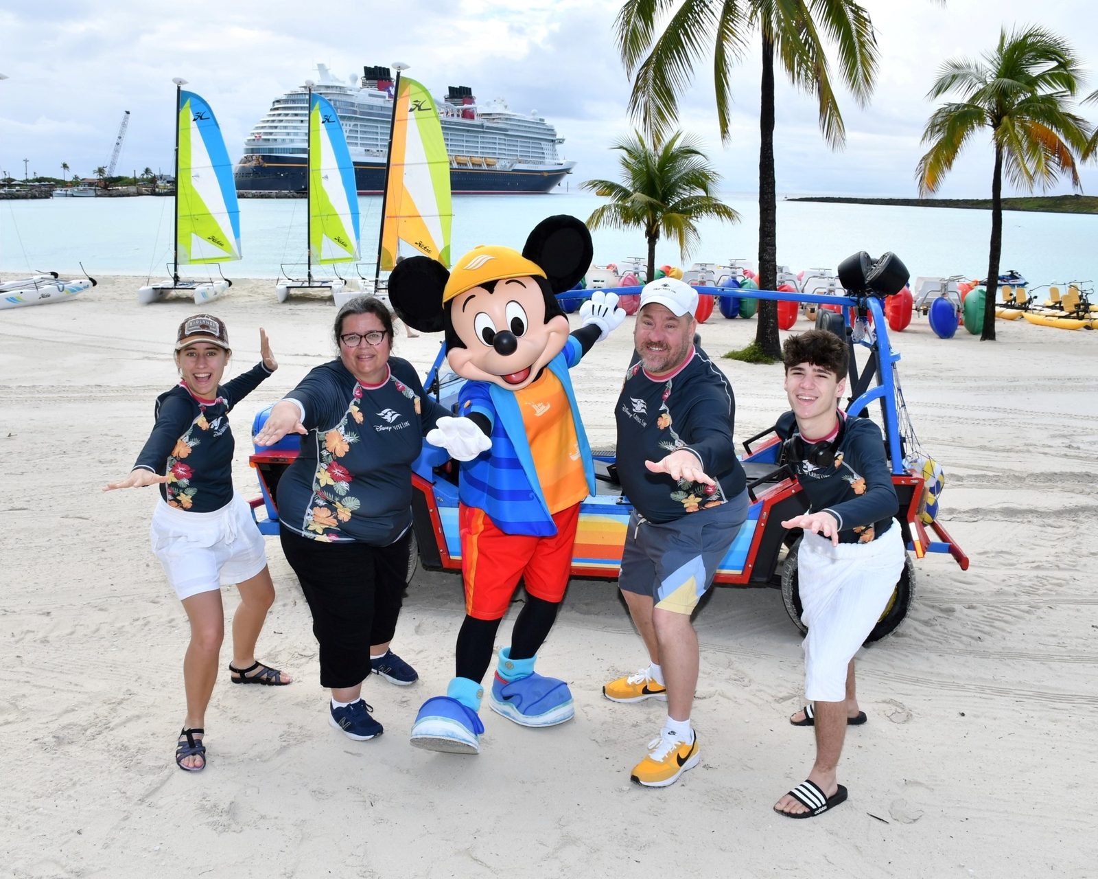 Lisa, Kathy, Mickey Mouse in his Castaway Cay outfit, Michael & Thomas at Castaway Cay