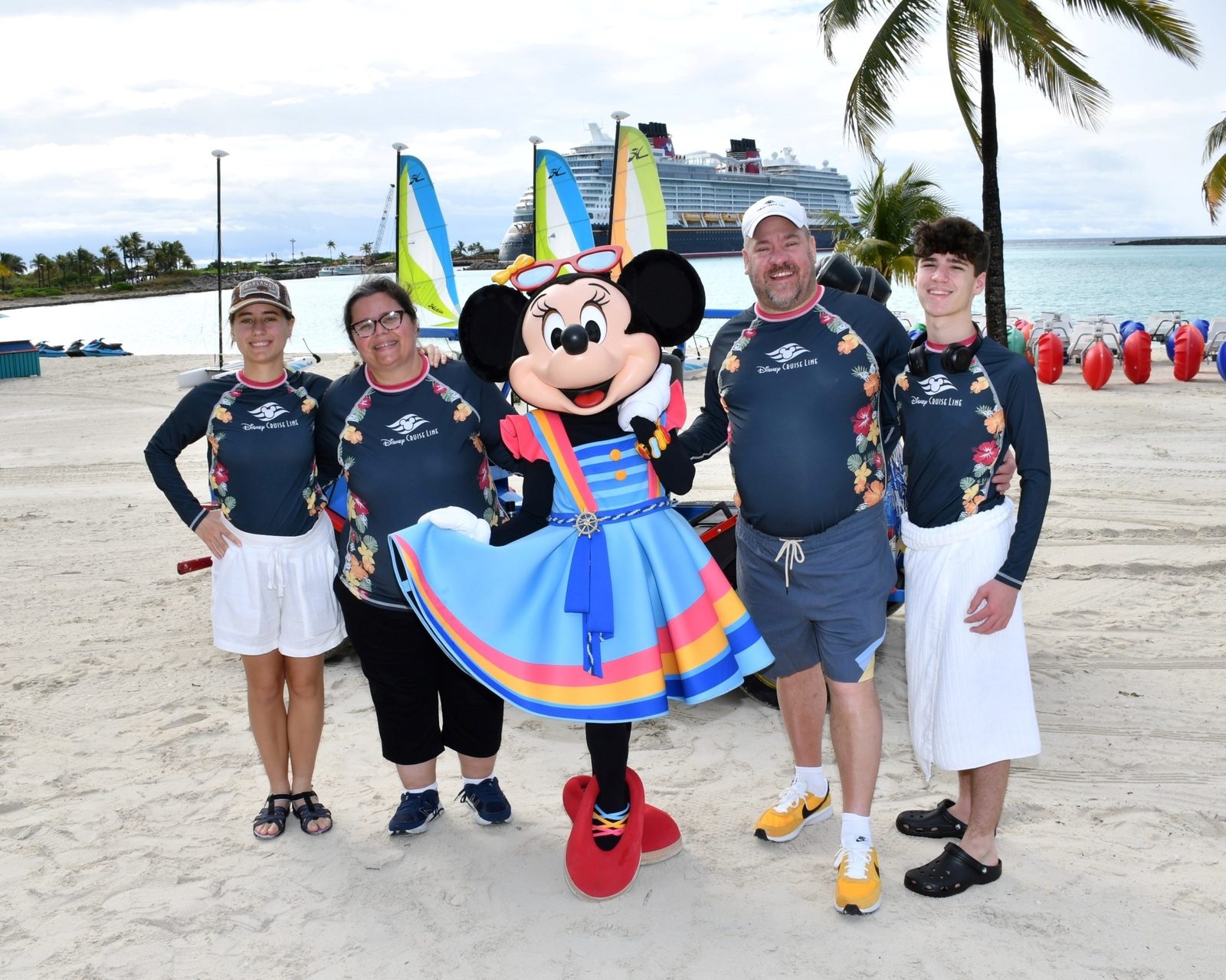 Lisa, Kathy, Minnie Mouse in her Castaway Cay outfit, Michael & Thomas at Castaway Cay