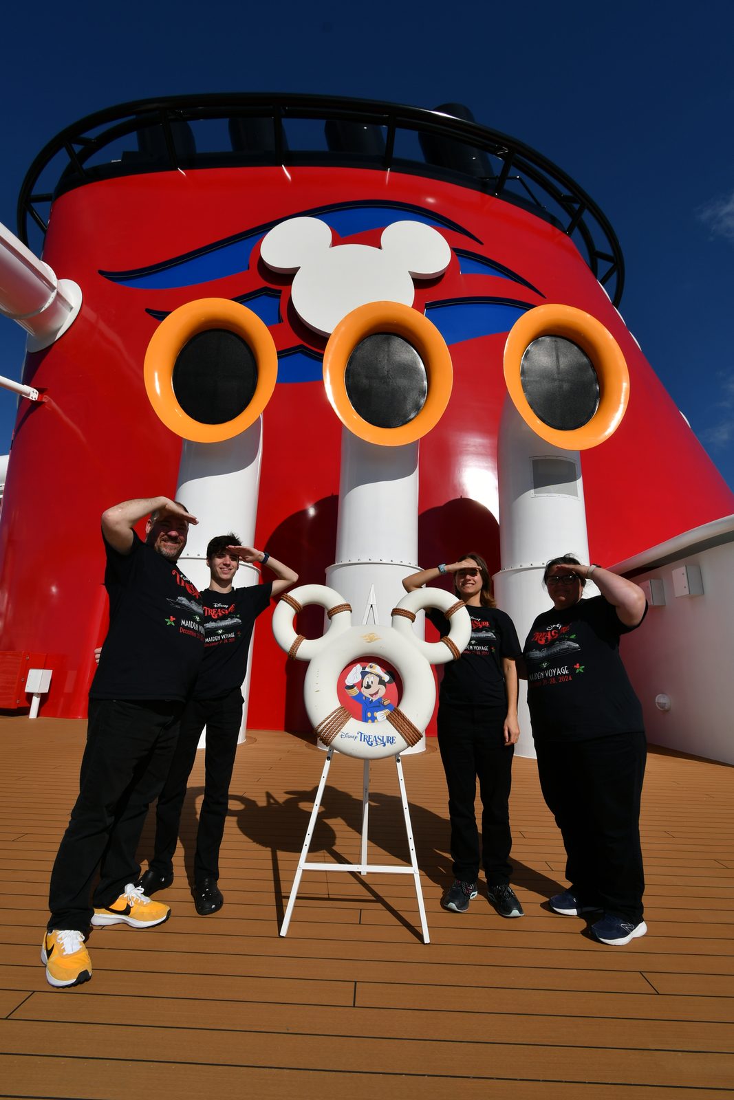 The family at the ship's funnel