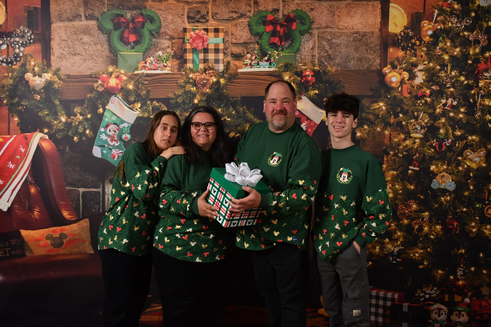 The family at the holiday fireplace