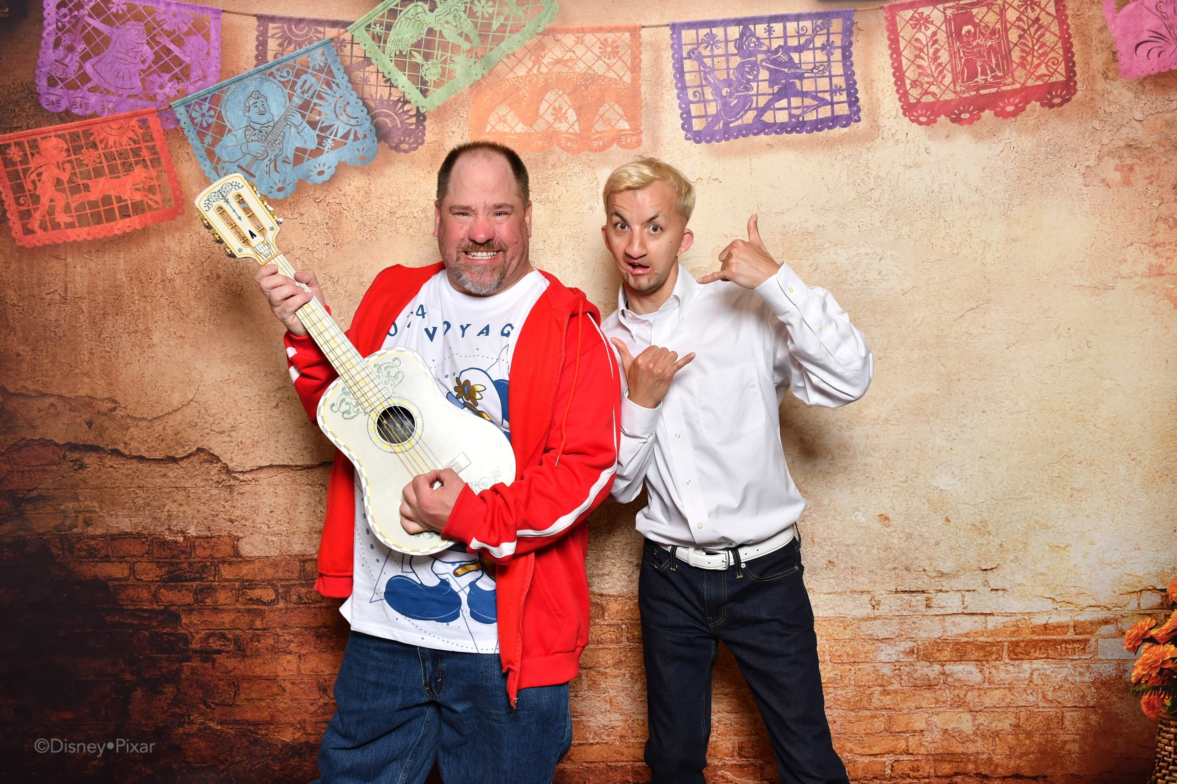 Marco and Michael at the Coco backdrop, take two