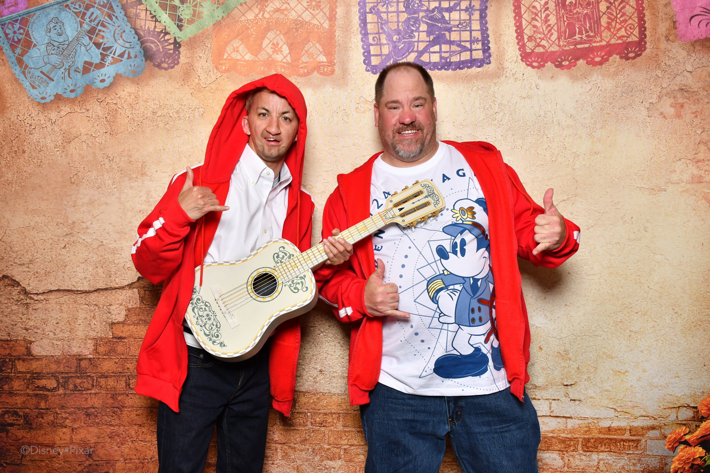 Marco and Michael at the Coco backdrop