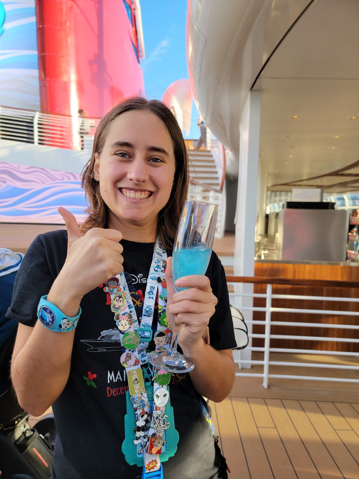 Lisa with her Cloudem Blue at sailaway on the Treasure