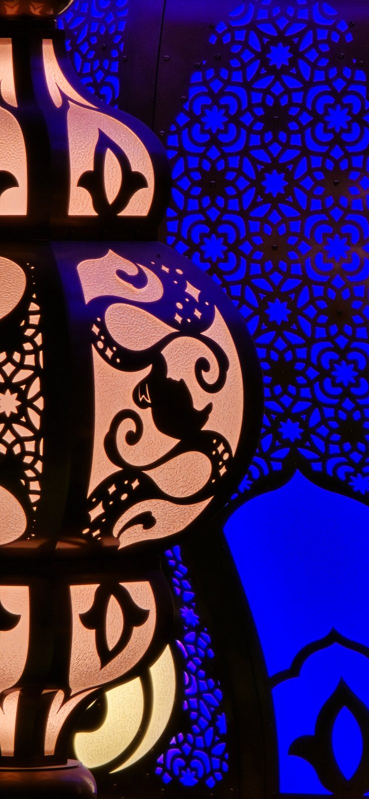 Mickey lanterns lit at night