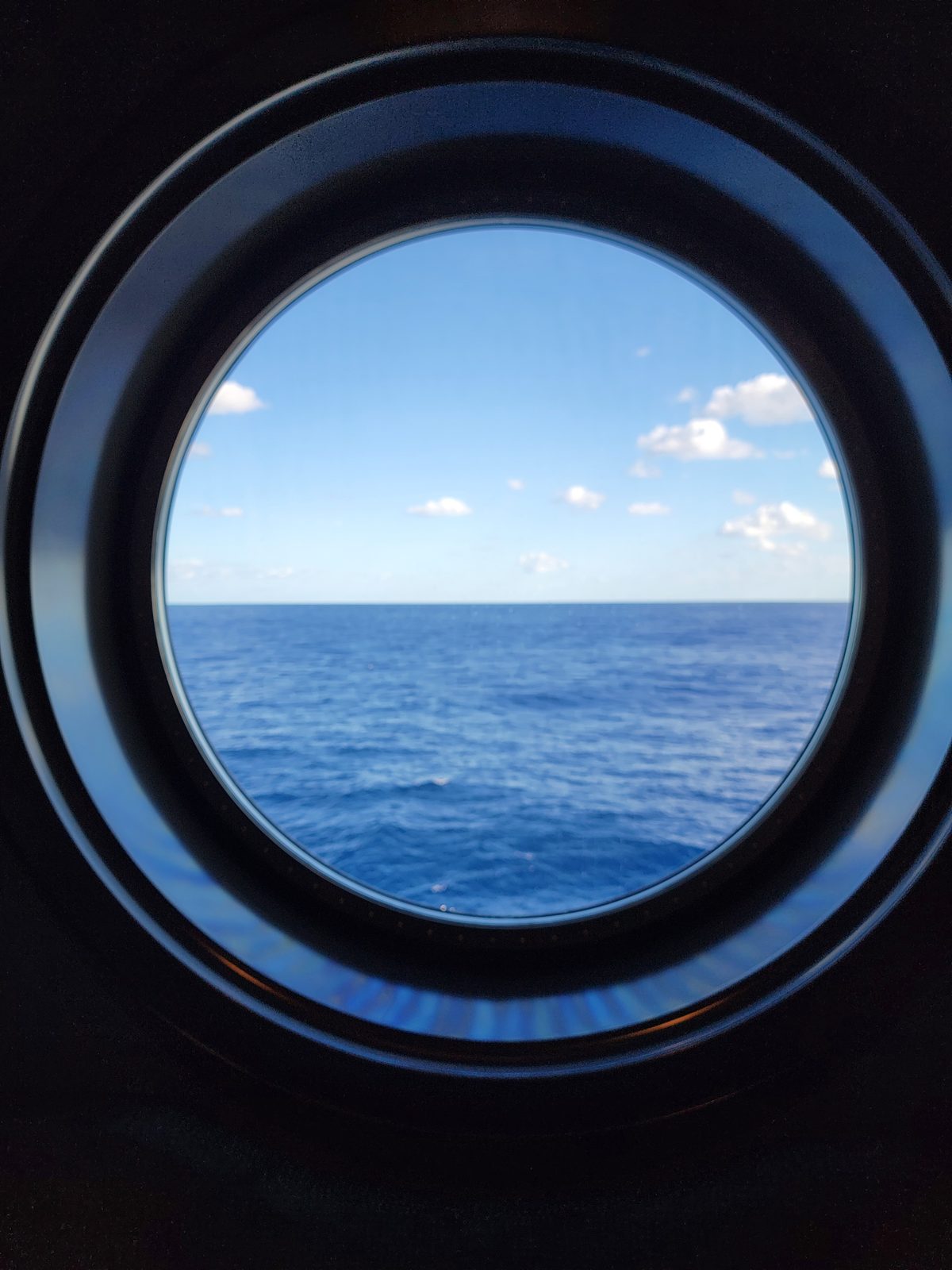 Ocean stretching past our porthole