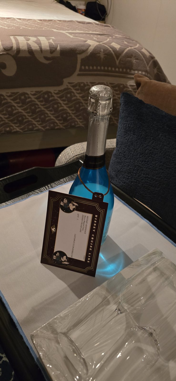 A bottle of Cloudem Blue waiting in our stateroom on the Treasure