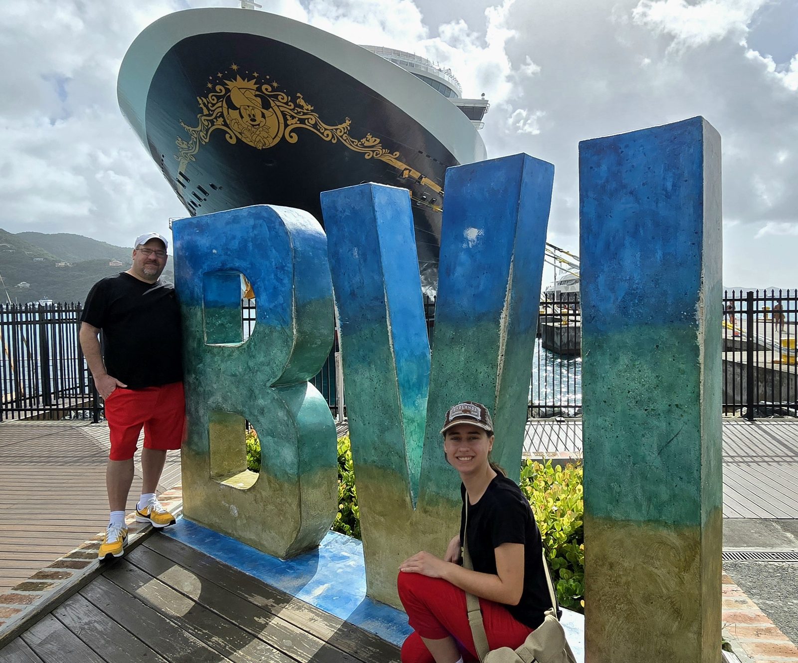 Michael at the BVI sign