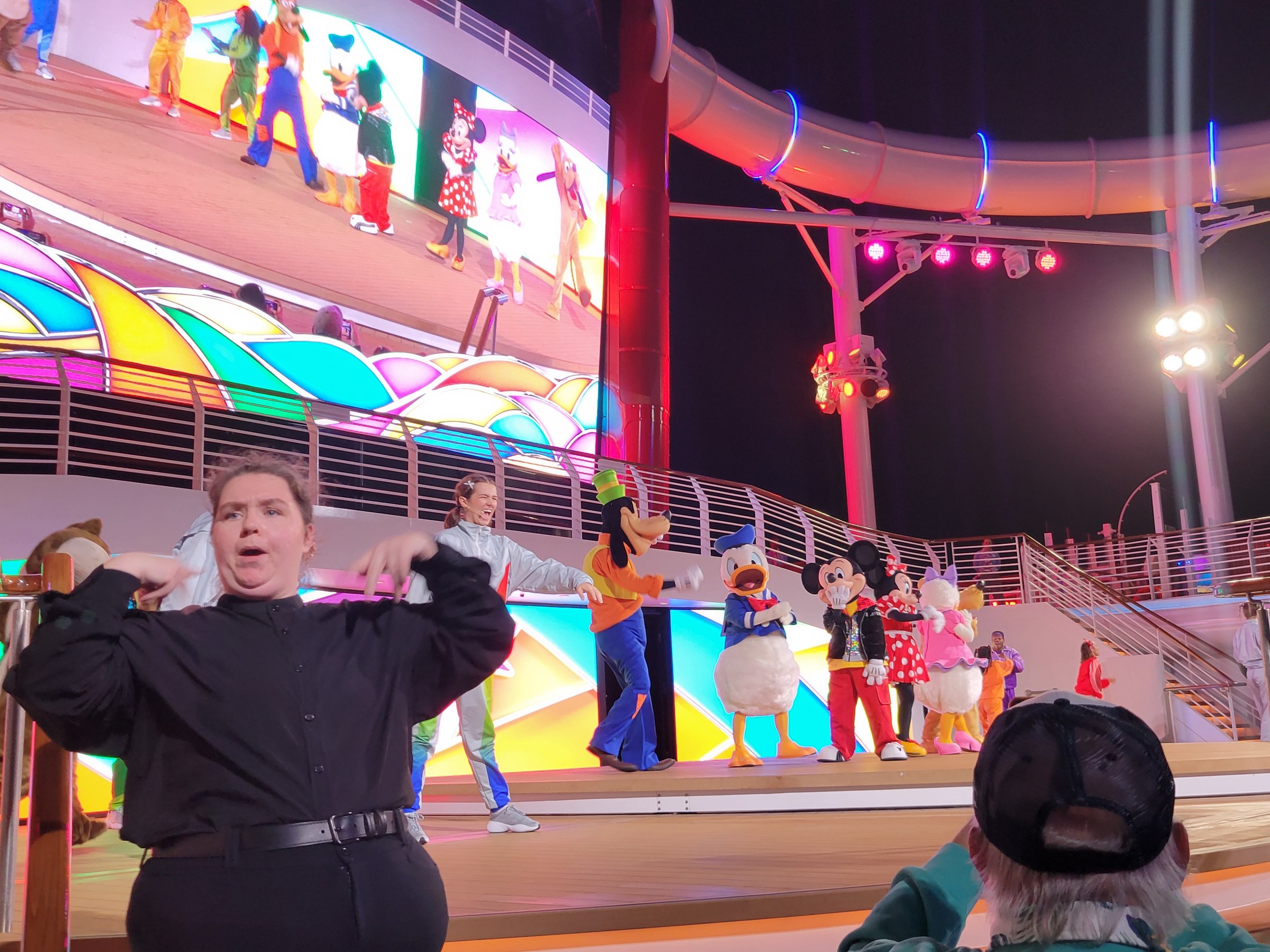 Kelly signing Mickey's Color Spin Dance Party on Christmas Eve