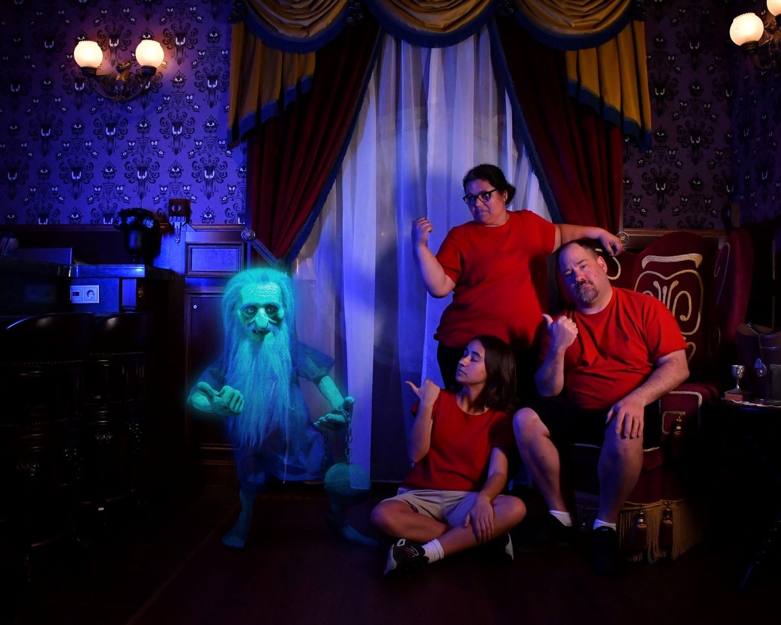 Kathy, Lisa and Michael in the Haunted Mansion Parlor
