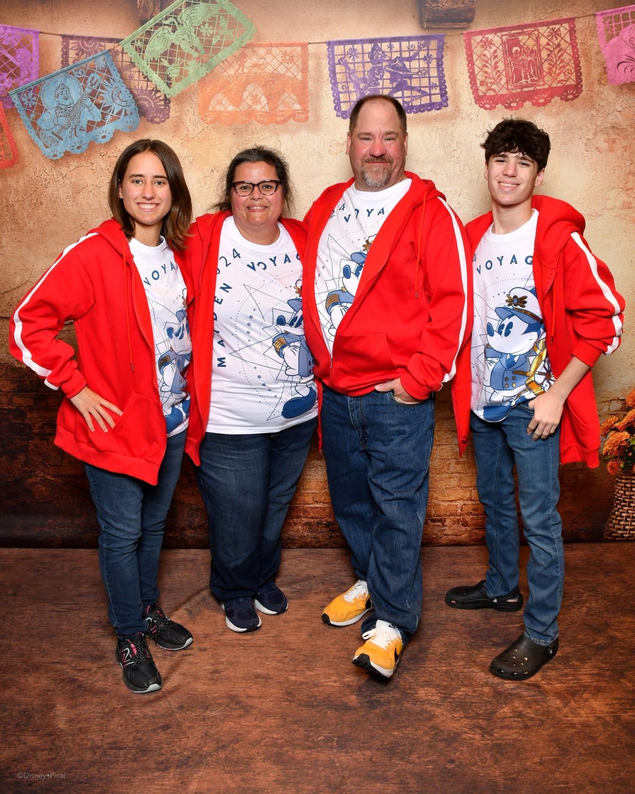 The four of us at the Coco backdrop on the Treasure