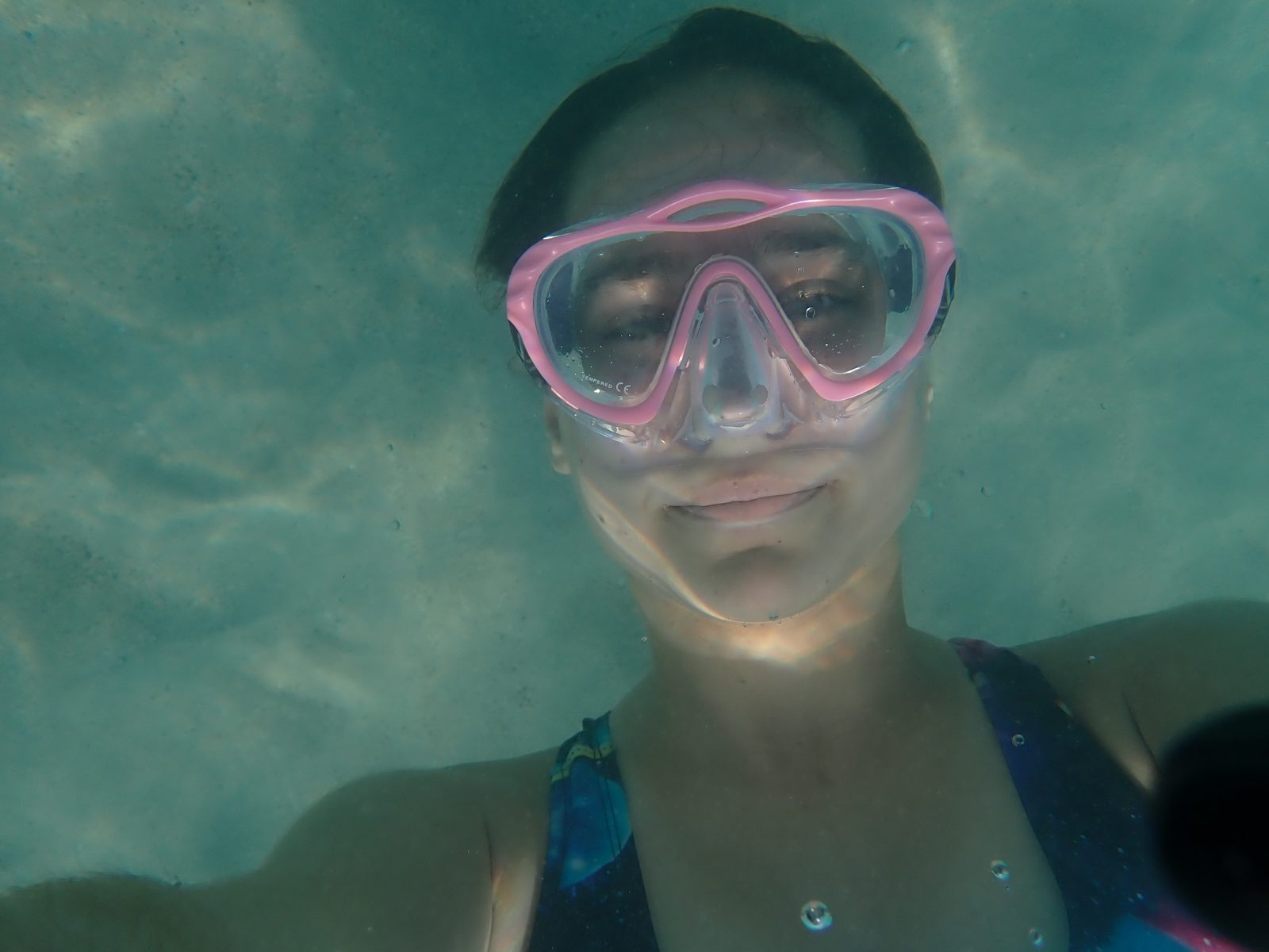 Lisa snorkeling in the shallow water