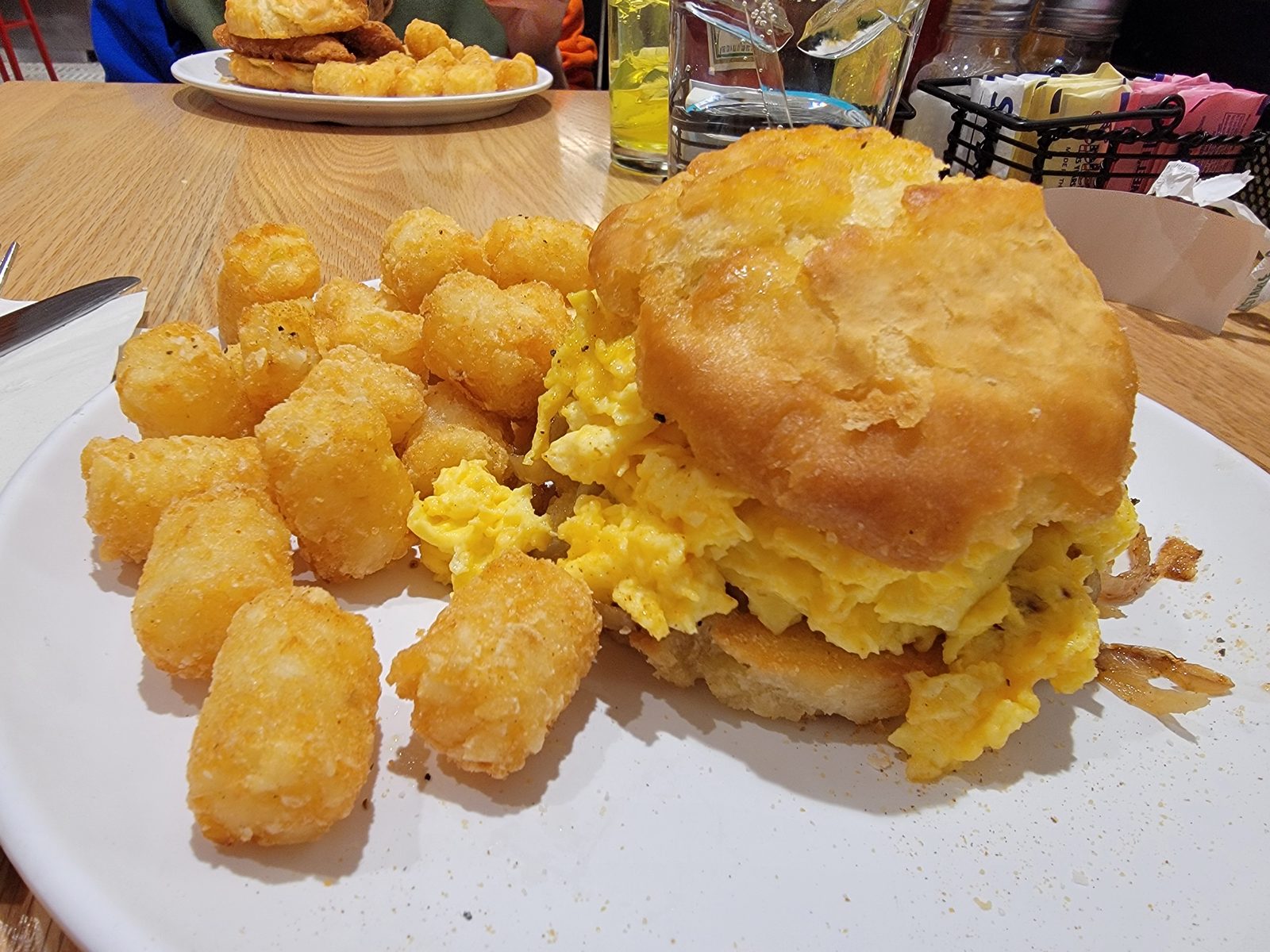 Breakfast before the early flight, biscuit and tots