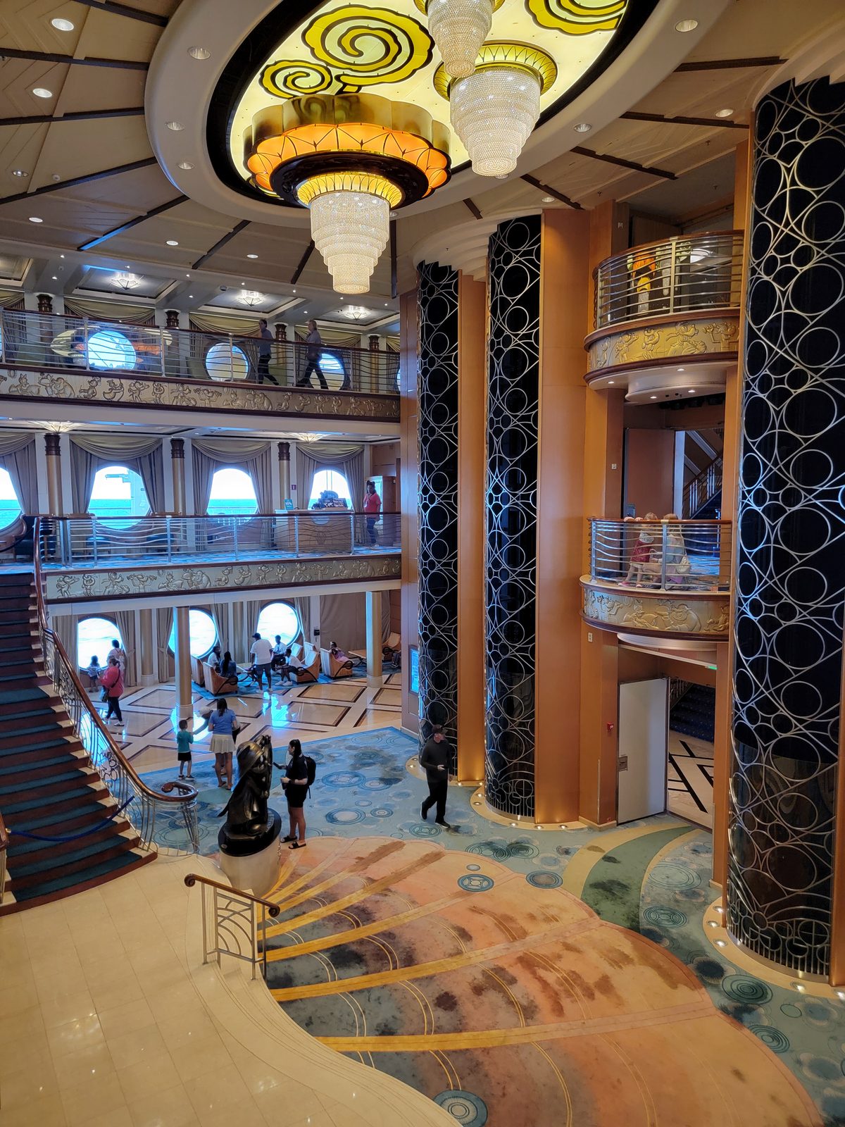 The grand staircase rising through the atrium