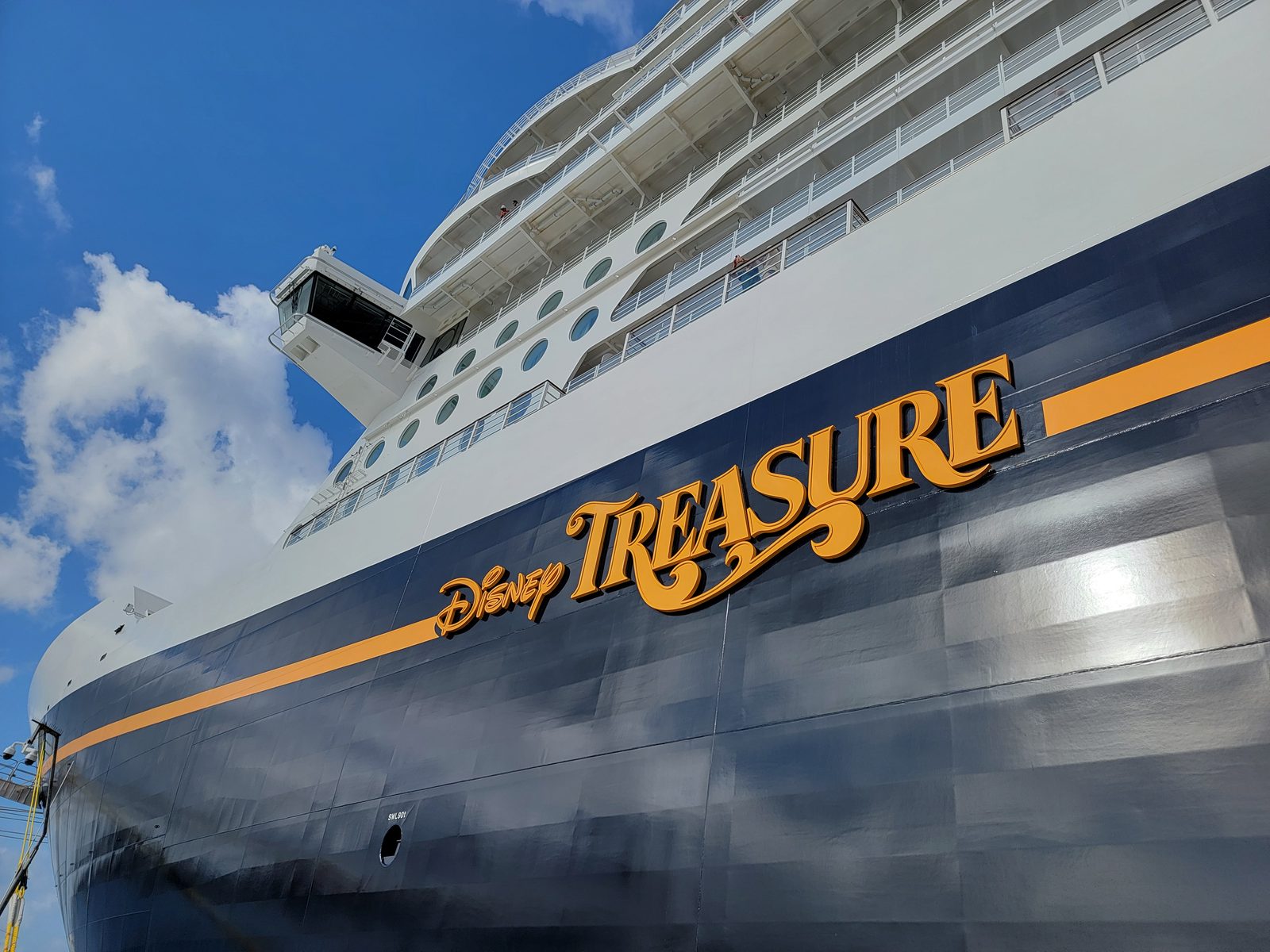 The Disney Treasure's nameplate up close