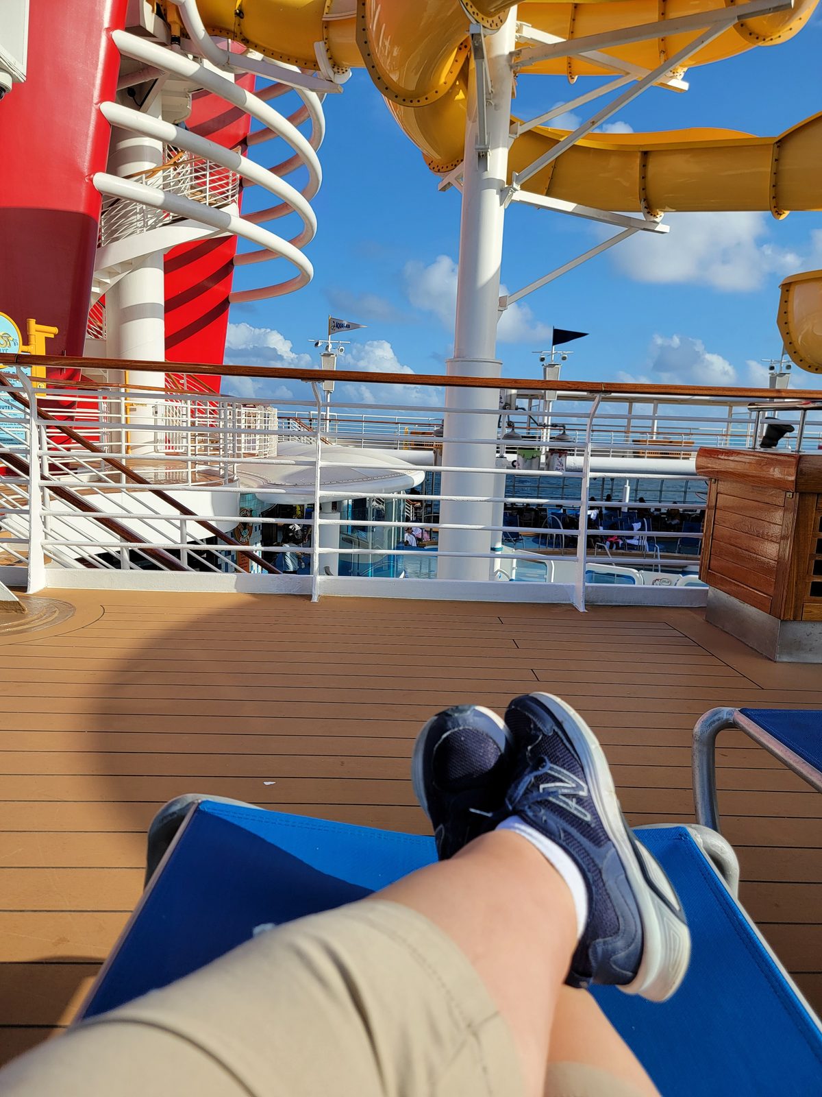 Feet up on a deck chair in the sun