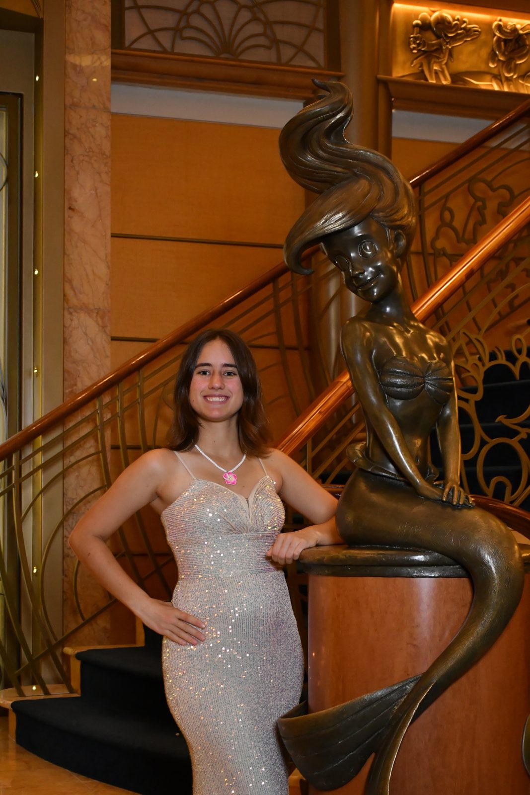 Lisa by the Ariel statue on formal night