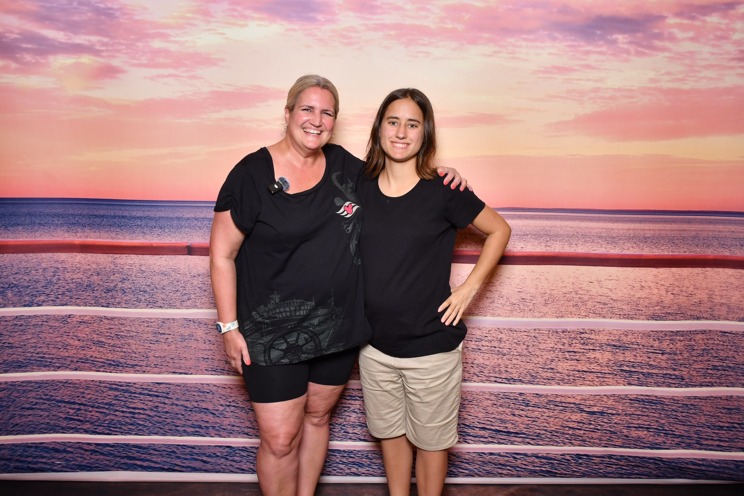 Stefanie and Lisa at the sunset backdrop