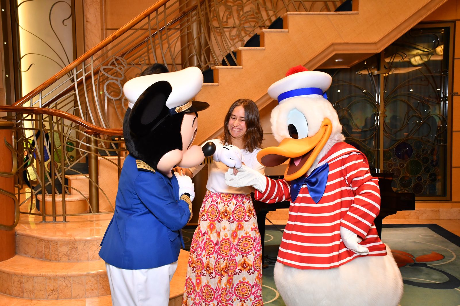 Captain Mickey, Lisa & Donald in his red-striped sailor outfit in the Lobby Atrium