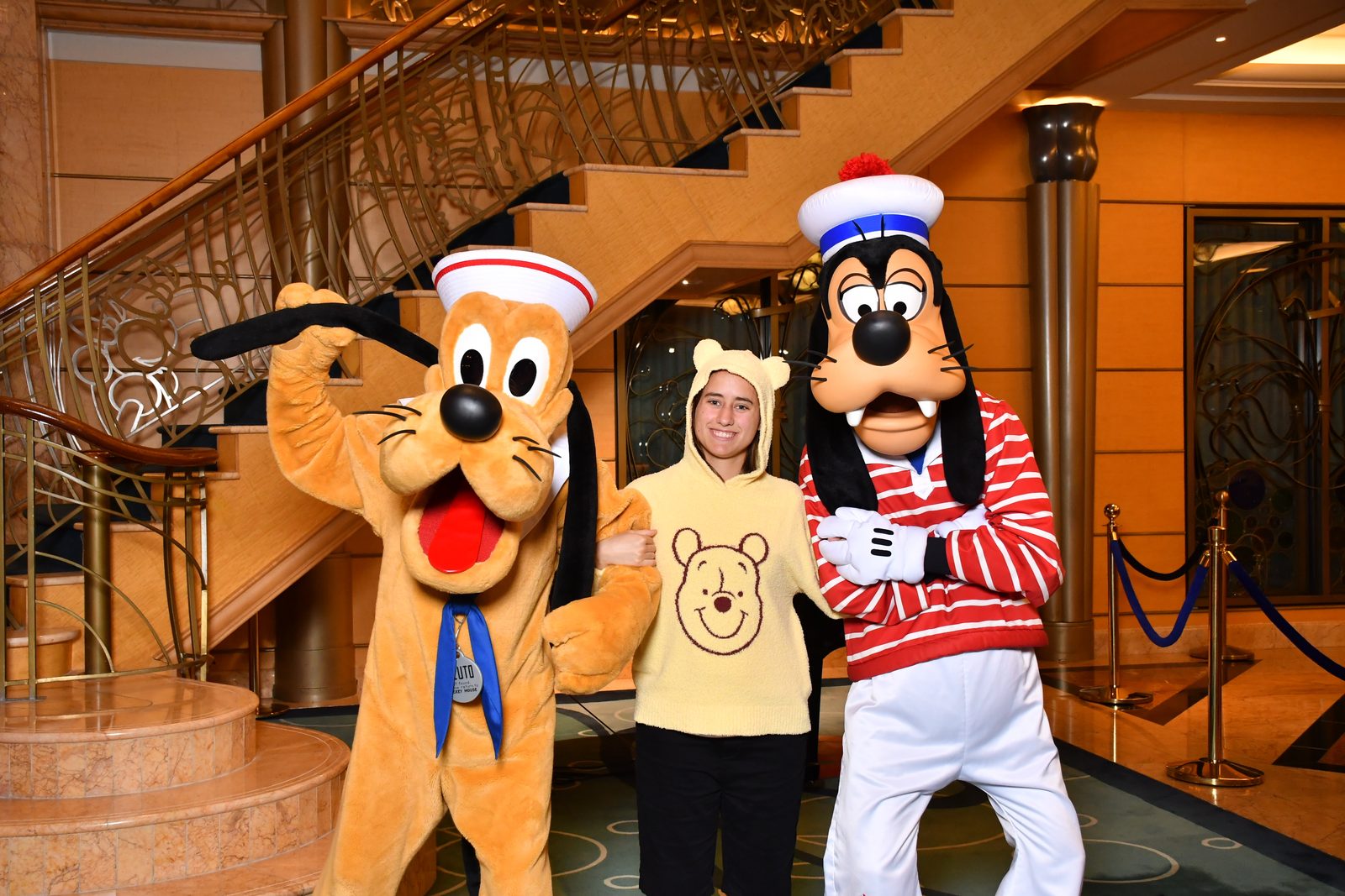 Pluto, Lisa and Goofy in their sailor outfits in the Lobby Atrium