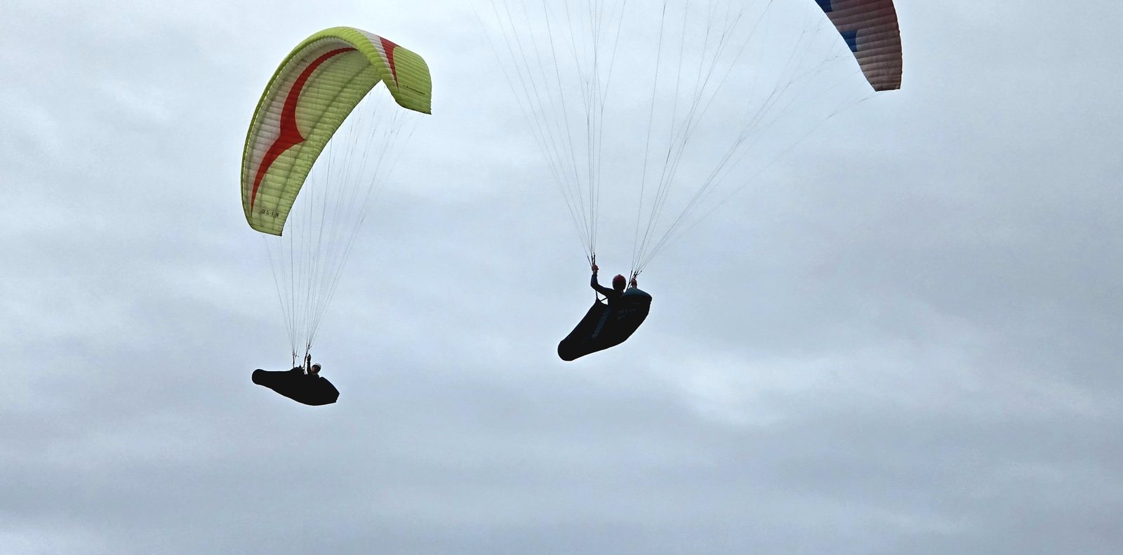 Paragliders launching off Ouen Toro