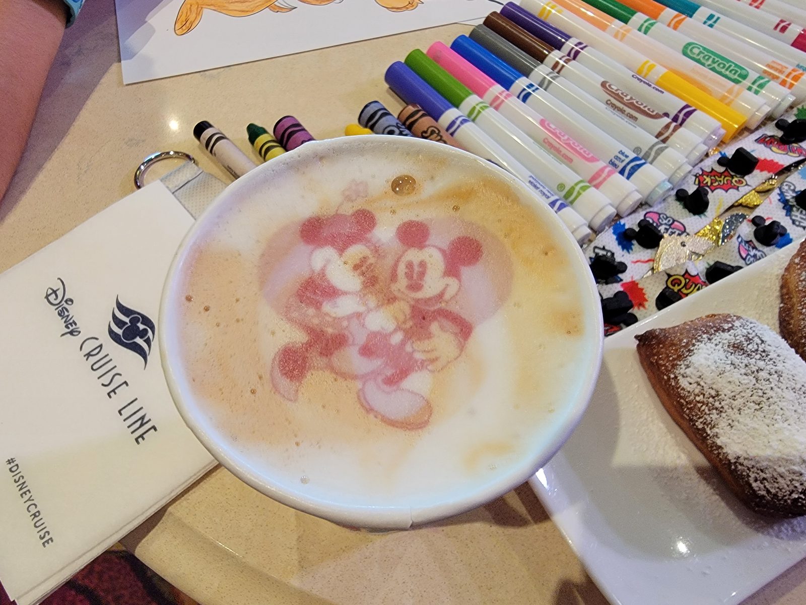 Mickey and Minnie latte during Lisa's coloring time