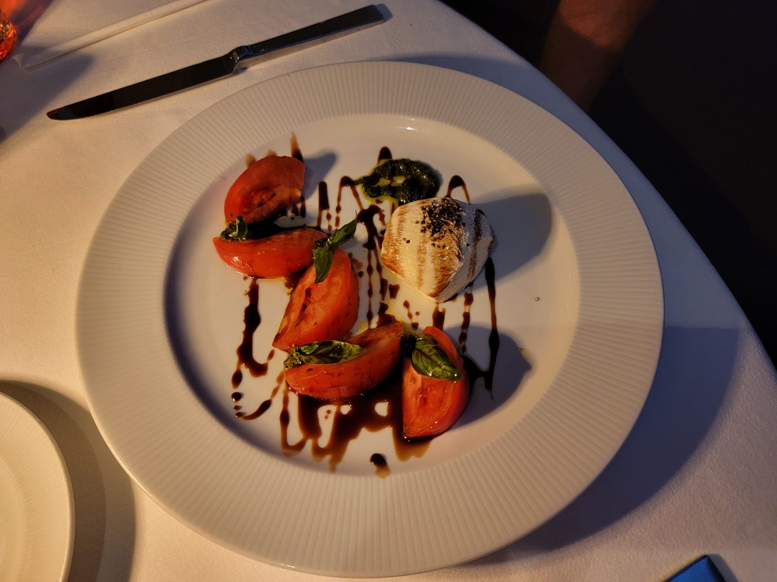 Tomato and mozzarella caprese to start dinner at Palo
