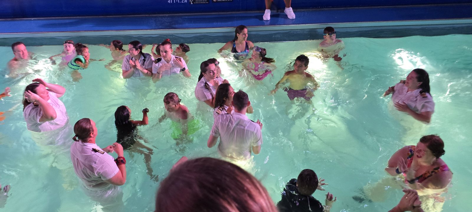Jumping into the pool in costume to end the night