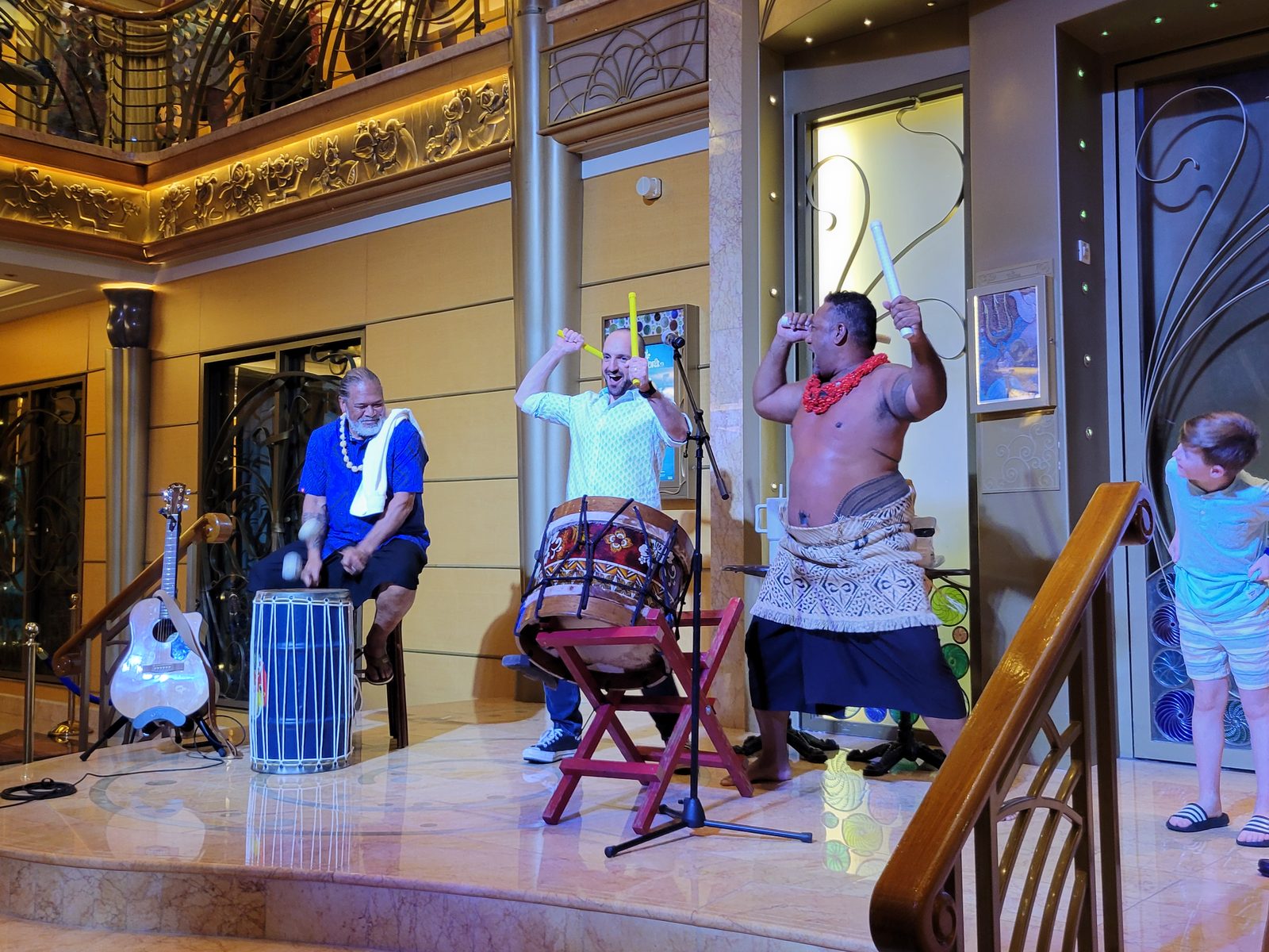 Drummers and dancers perform in the atrium